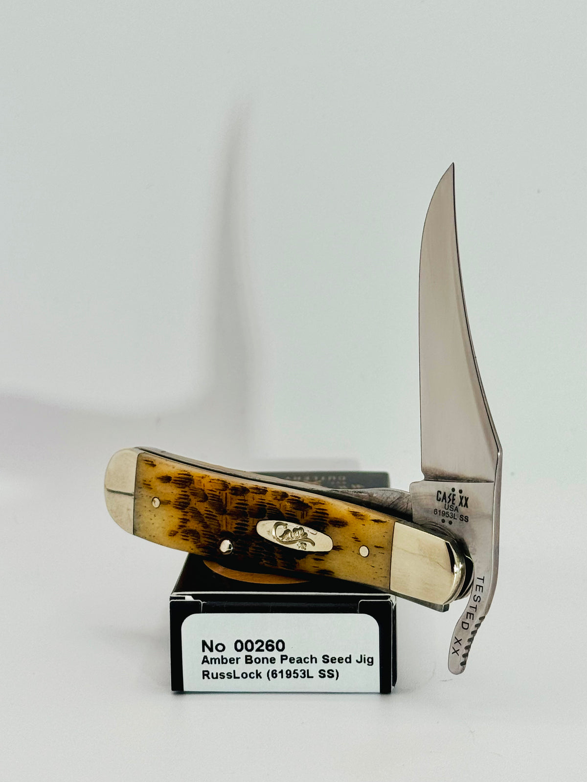 Case XX 00260 Amber Bone Peach Seed Jig RussLock, photo 2