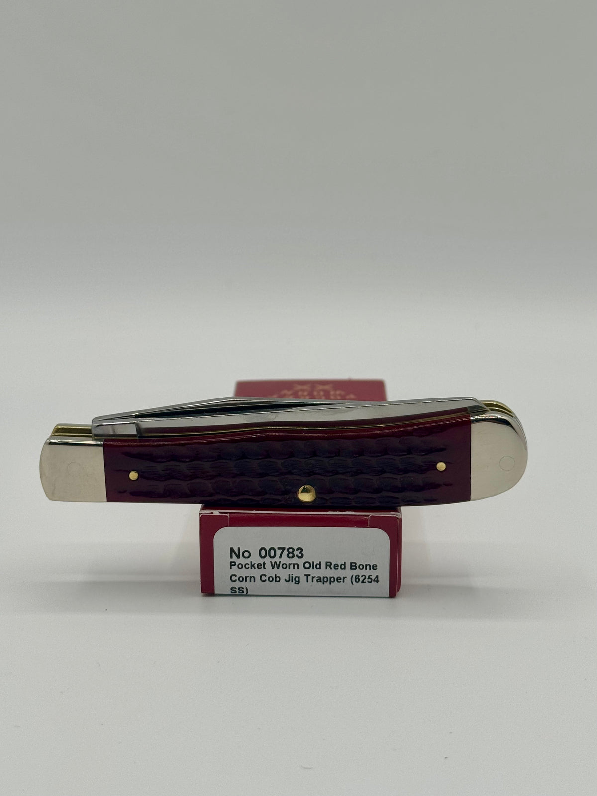 Case XX 00783 Pocket Worn Red Bone Trapper — packaging and knife together