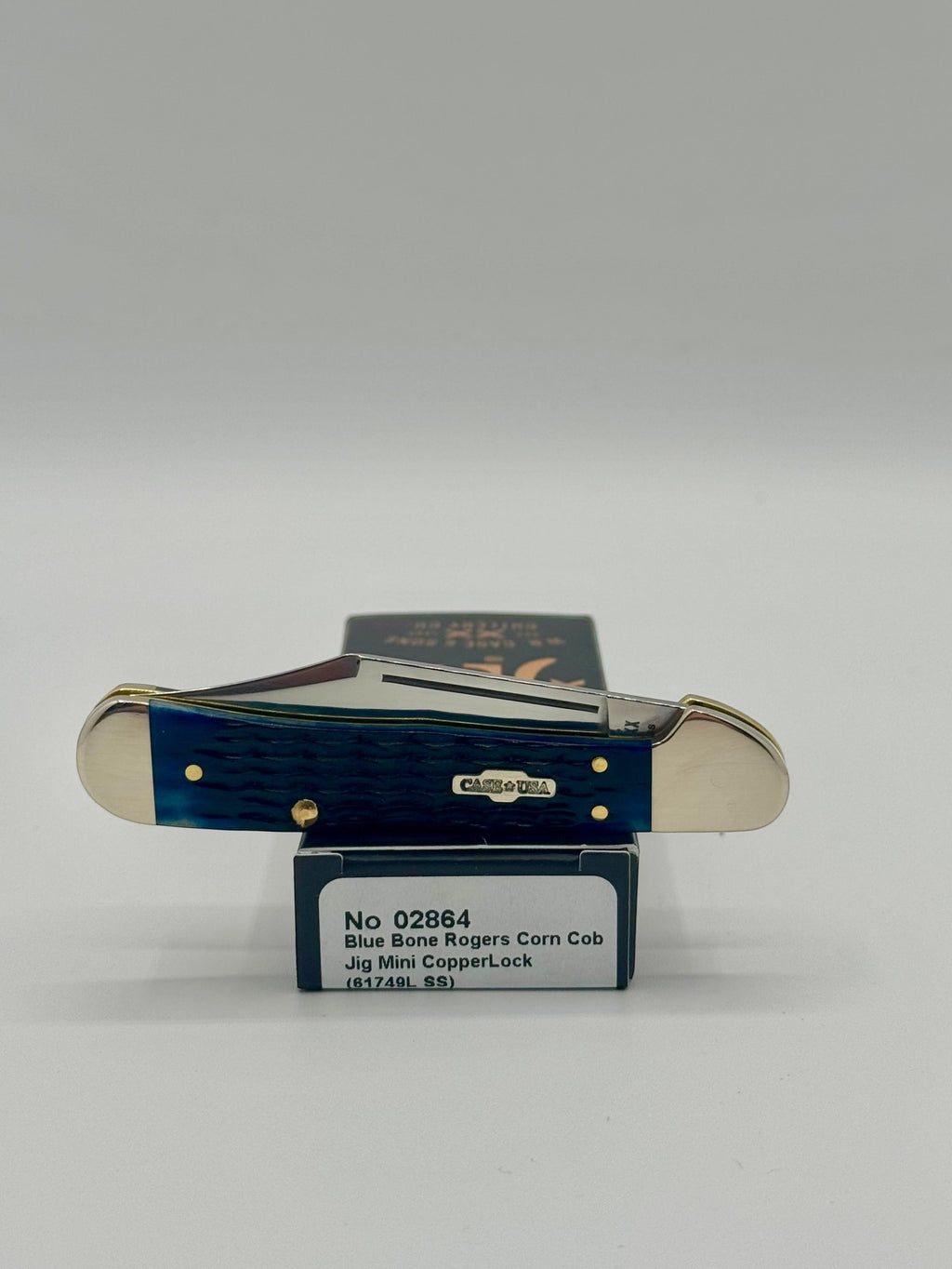 Case XX 02864 Blue Bone Mini CopperLock — lifestyle angle on Case box