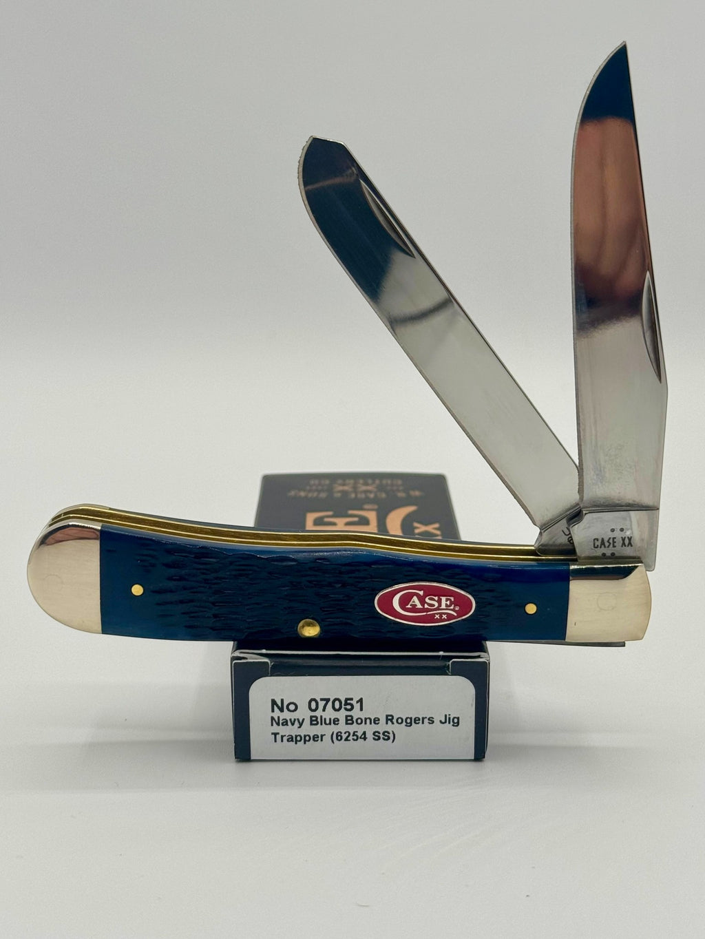 Case XX 07051 Navy Blue Bone Trapper — open on Case retail box