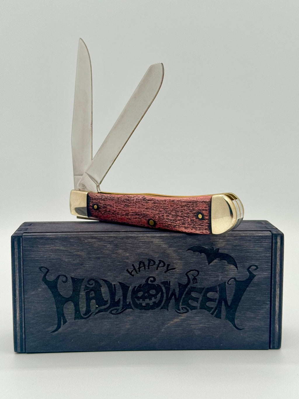 Case XX 10614 Halloween Color Wash Orange Trapper — handle and shield detail
