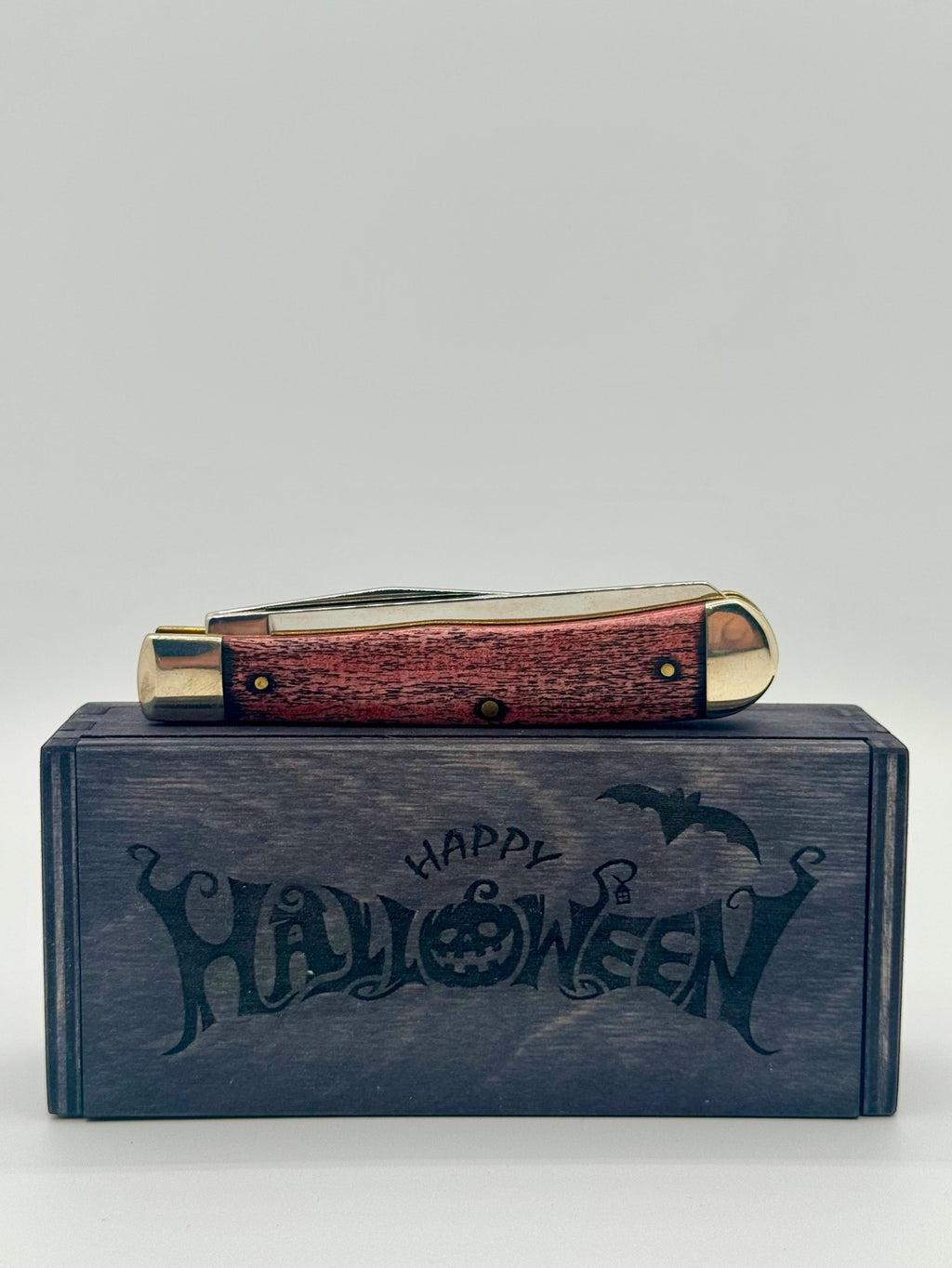 Case XX 10614 Halloween Color Wash Orange Trapper — packaging and knife together