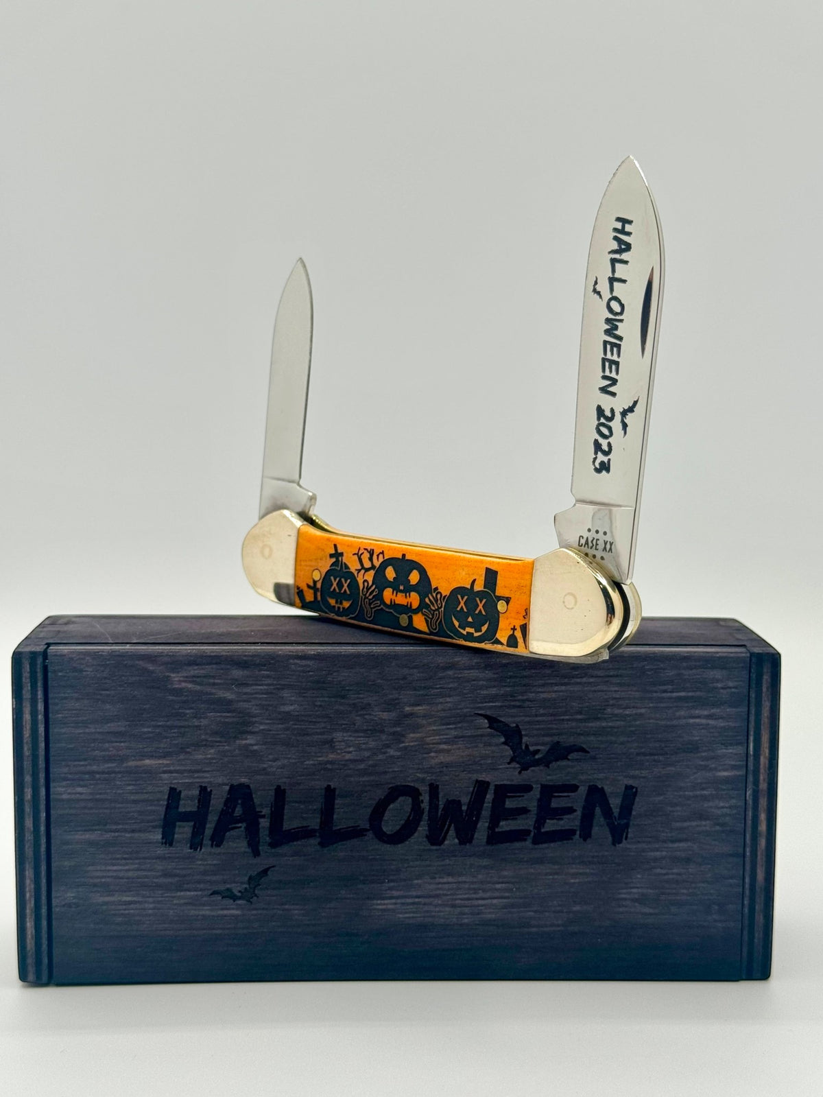 Case XX 10626 Halloween Persimmon Orange Bone Canoe — closed on Case box