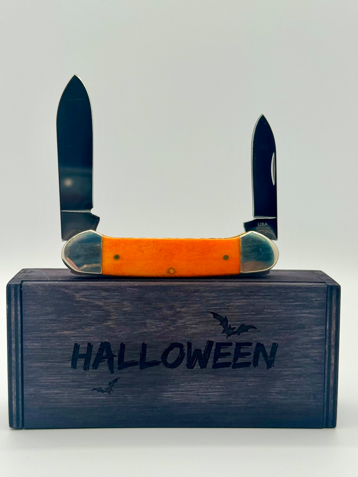 Case XX 10626 Halloween Persimmon Orange Bone Canoe — angled open view
