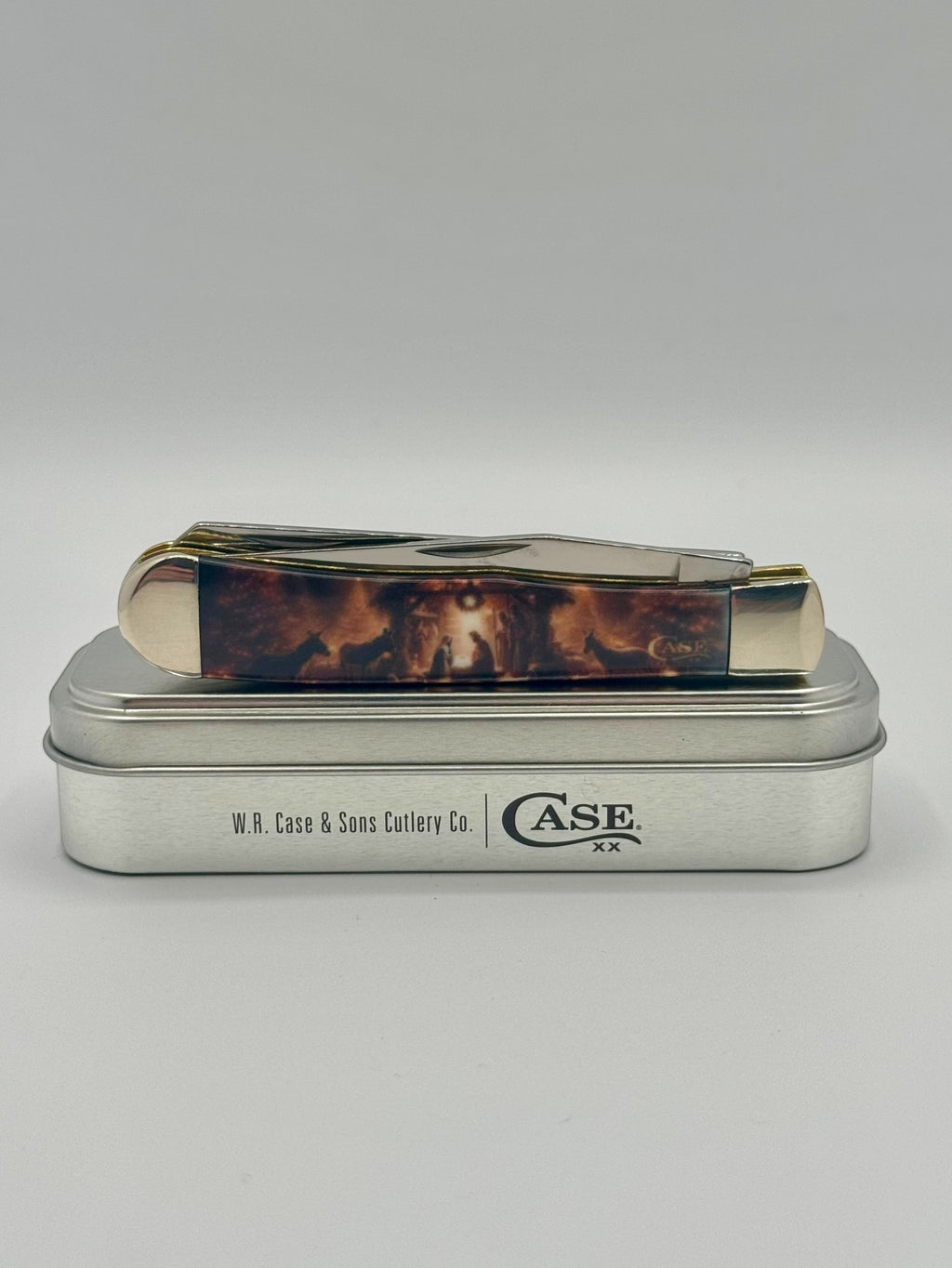 Case XX 10643 2025 Christmas CCI White Synthetic Trapper — lifestyle angle on Case box