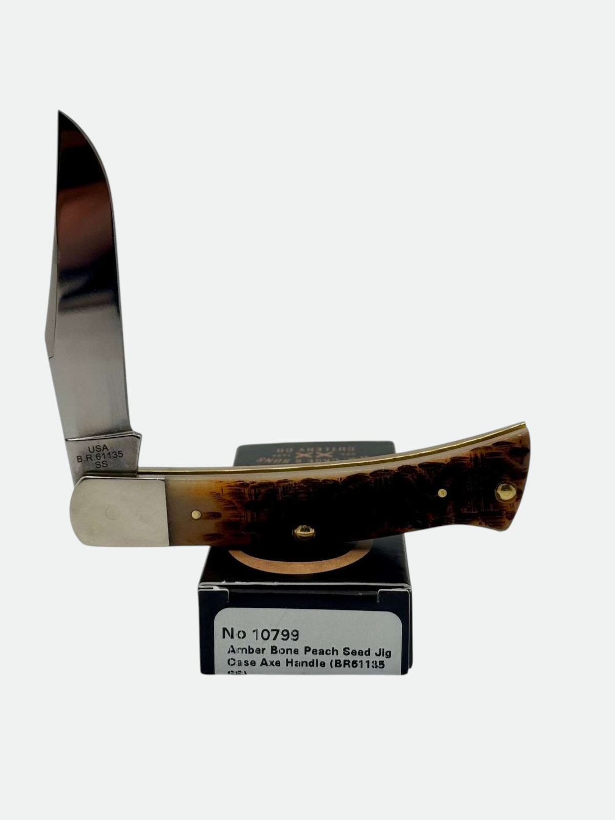 Pigeon Roost Knives Case XX Axe Handle pocket knife with amber bone peach seed jig scales and stainless steel blade