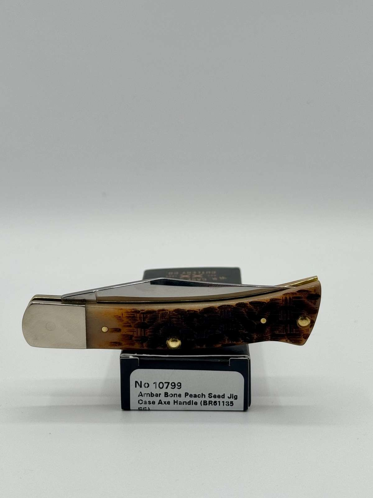 Pigeon Roost Knives Case XX Axe Handle pocket knife with amber bone peach seed jig scales and nickel silver bolsters