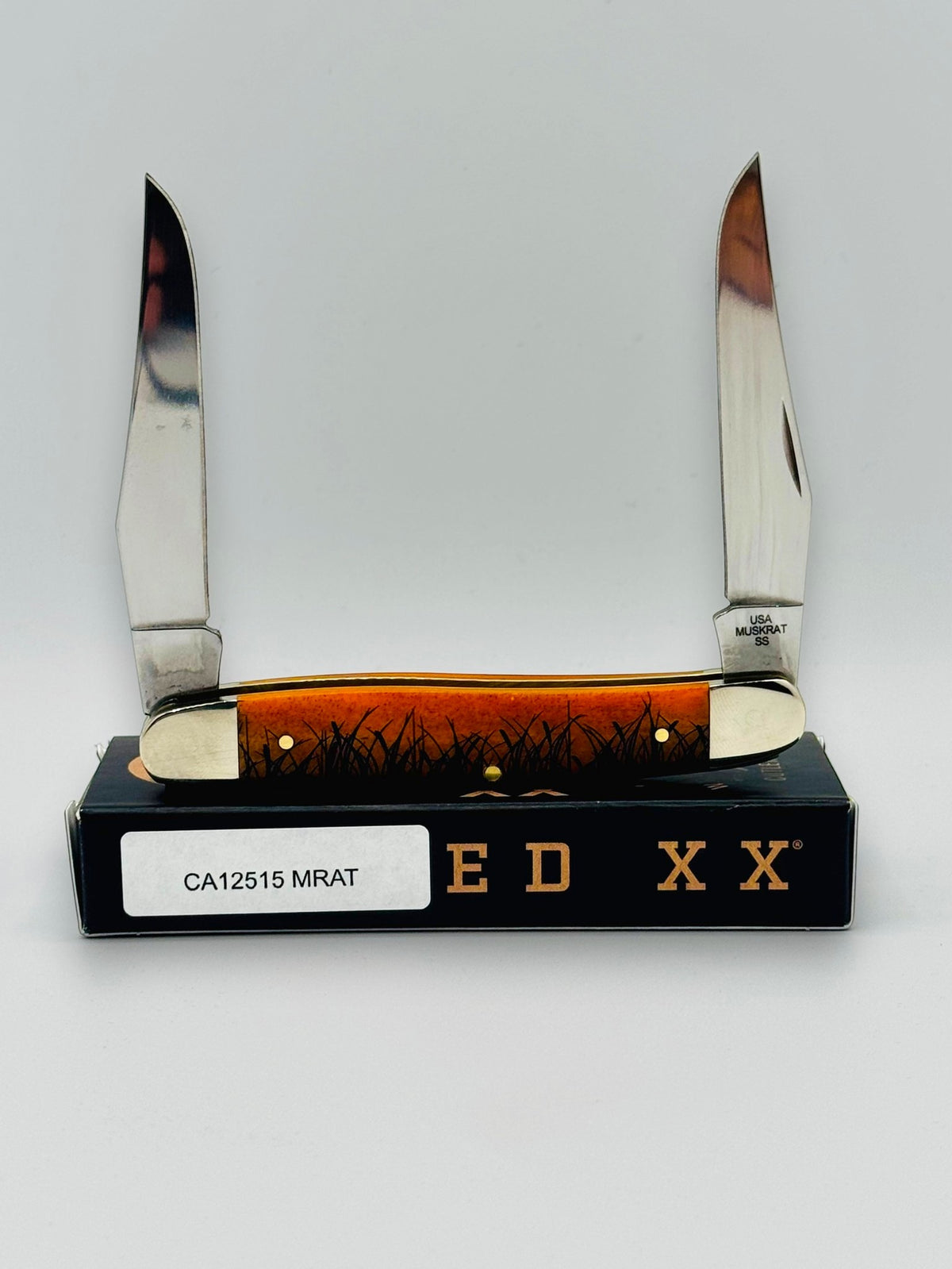 Case XX 12517MRAT Muskrat Engraving Red Bone — engraving detail