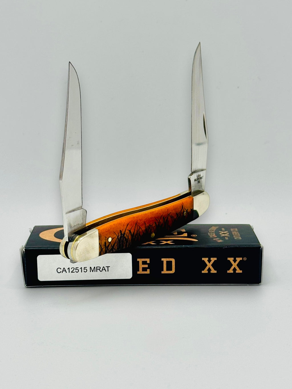 Case XX 12517MRAT Muskrat Engraving Red Bone — side profile