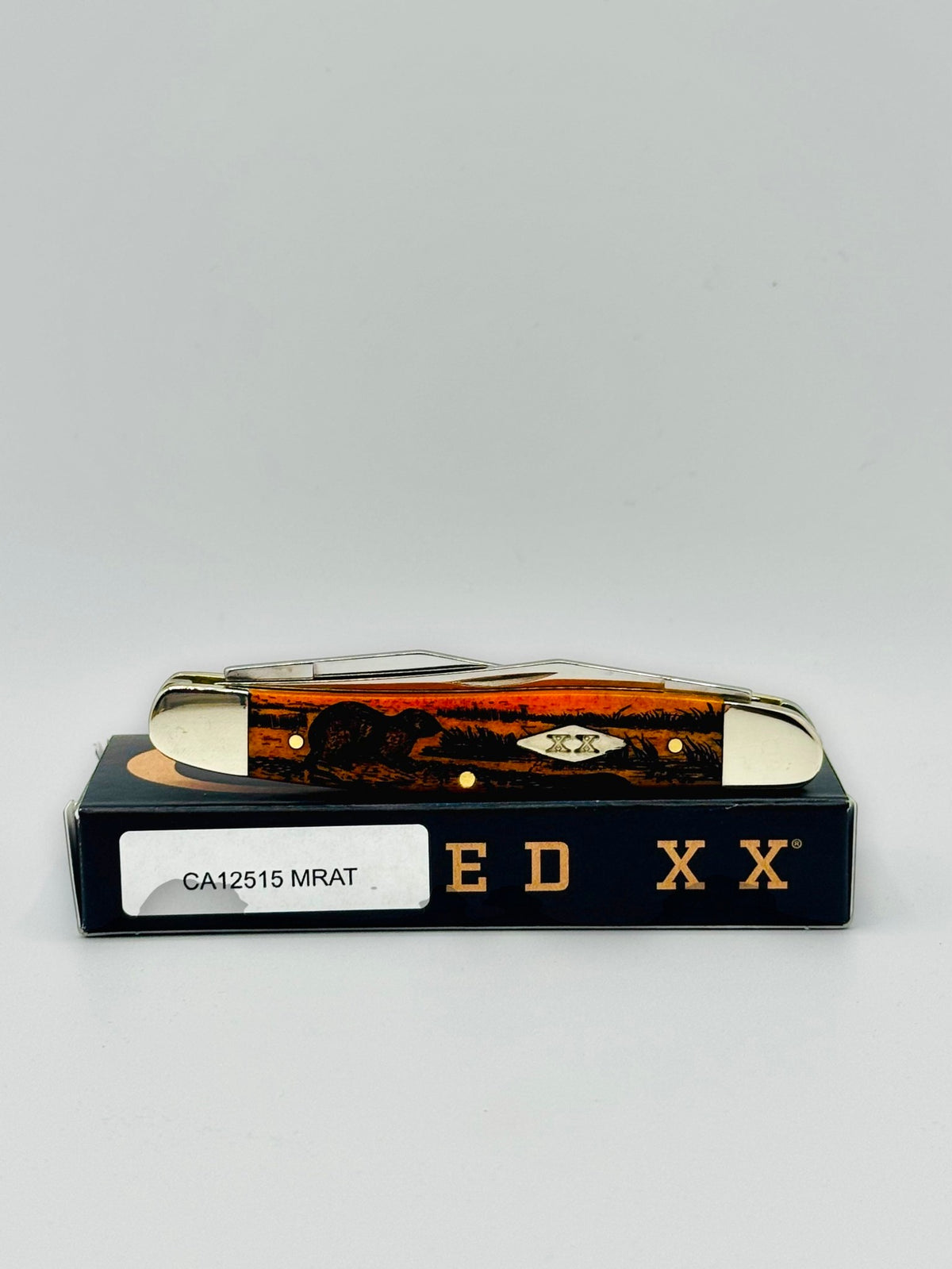 Case XX 12517MRAT Muskrat Engraving Red Bone — back side