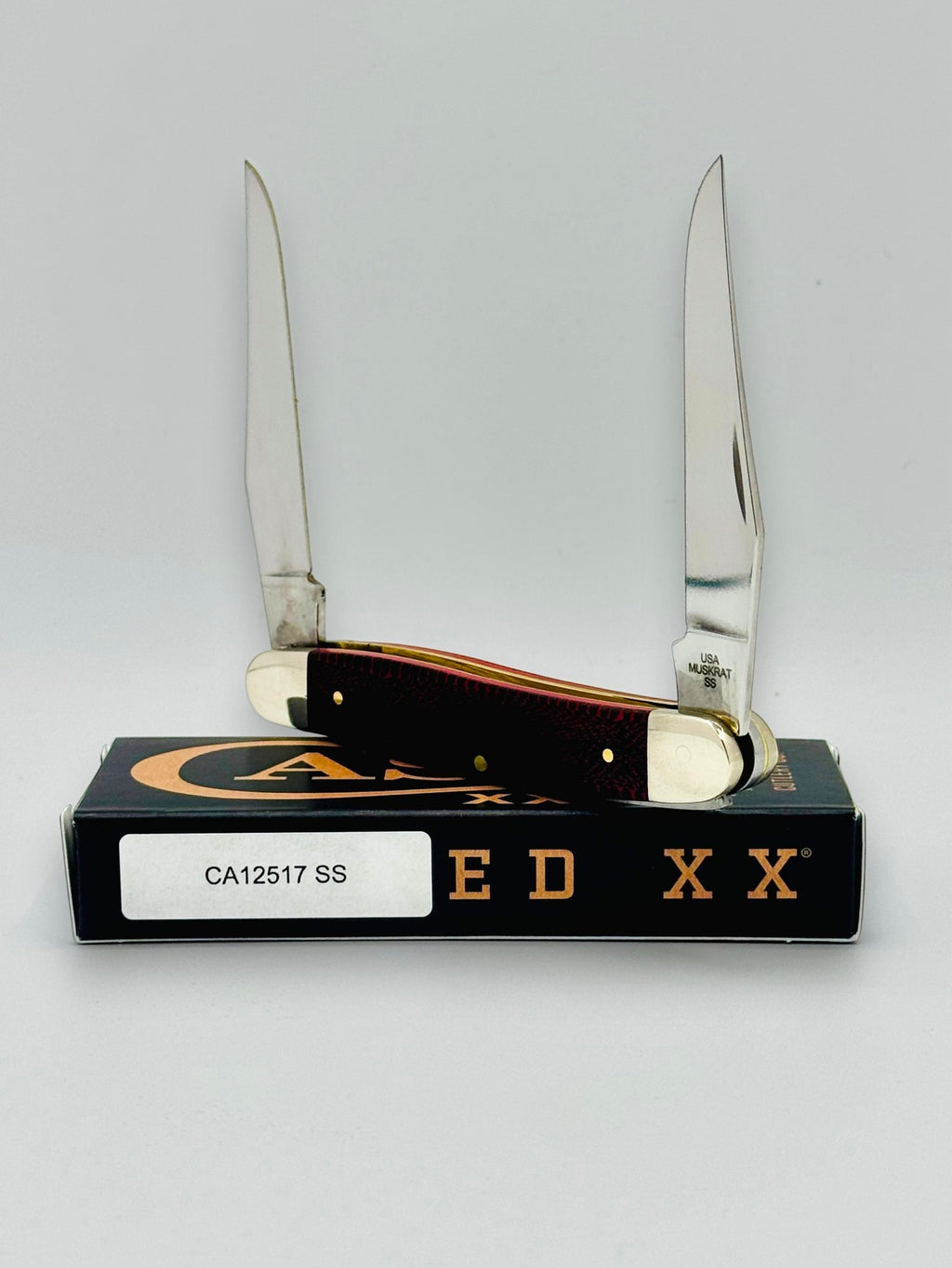 Case XX 12517SS Muskrat Snake Skin Red Bone — open reverse view