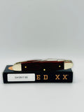 Case XX 12517SS Muskrat Snake Skin Red Bone — closed on Case box
