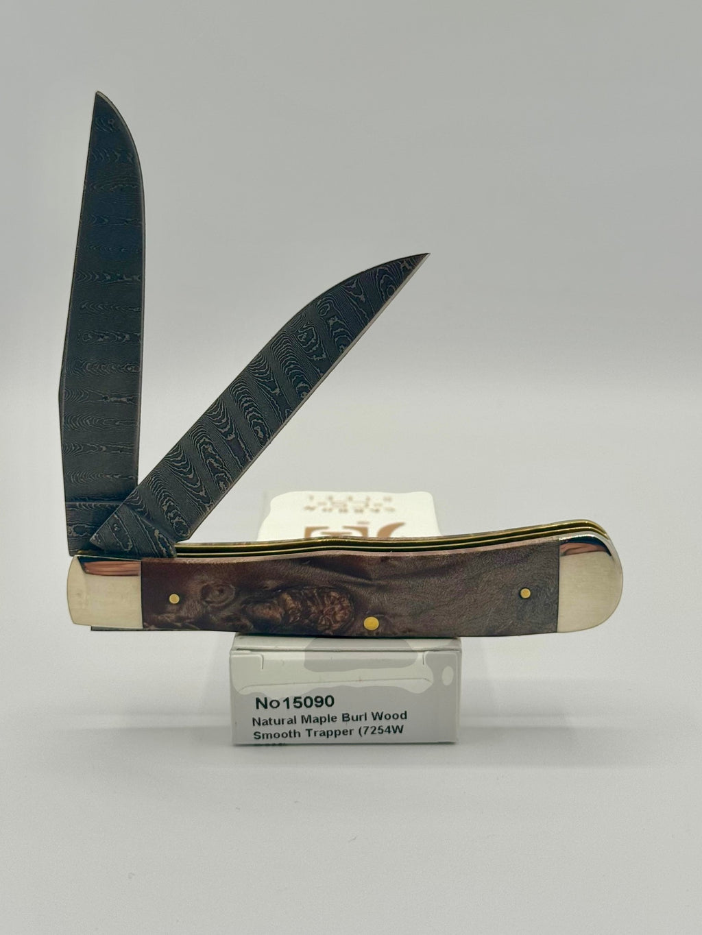 Case XX 15090 Natural Maple Burl Wood Ladder Damascus Trapper — angled open view