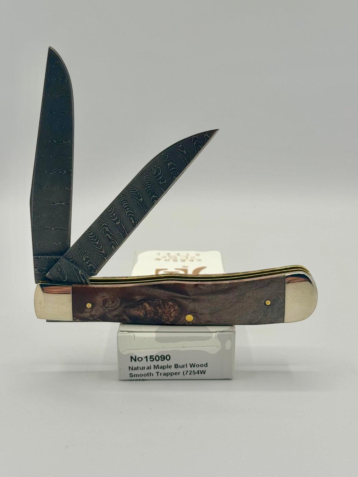 Case XX 15090 Natural Maple Burl Wood Ladder Damascus Trapper — angled open view