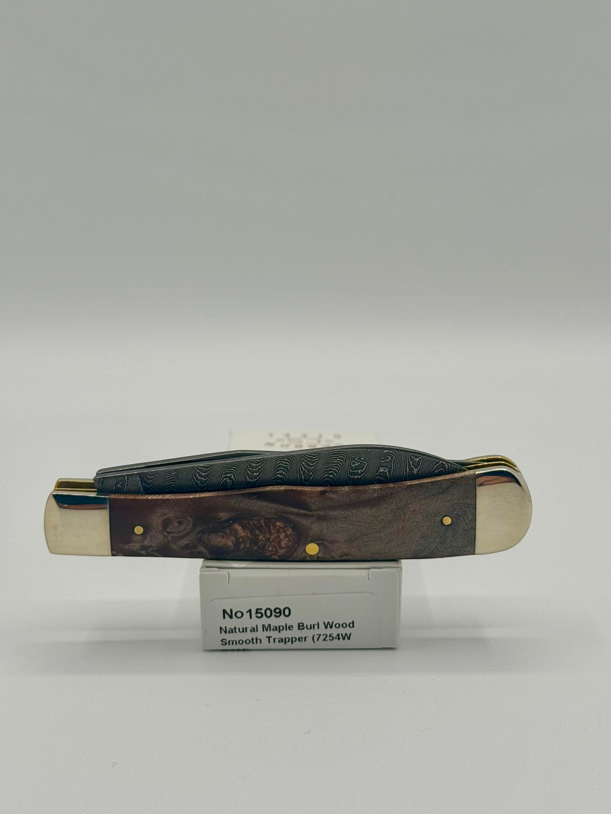 Case XX 15090 Natural Maple Burl Wood Ladder Damascus Trapper — packaging and knife together