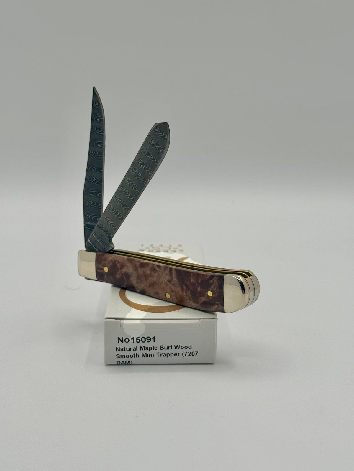 Case XX 15091 Natural Maple Burl Wood Ladder Damascus Mini Trapper — handle and shield detail