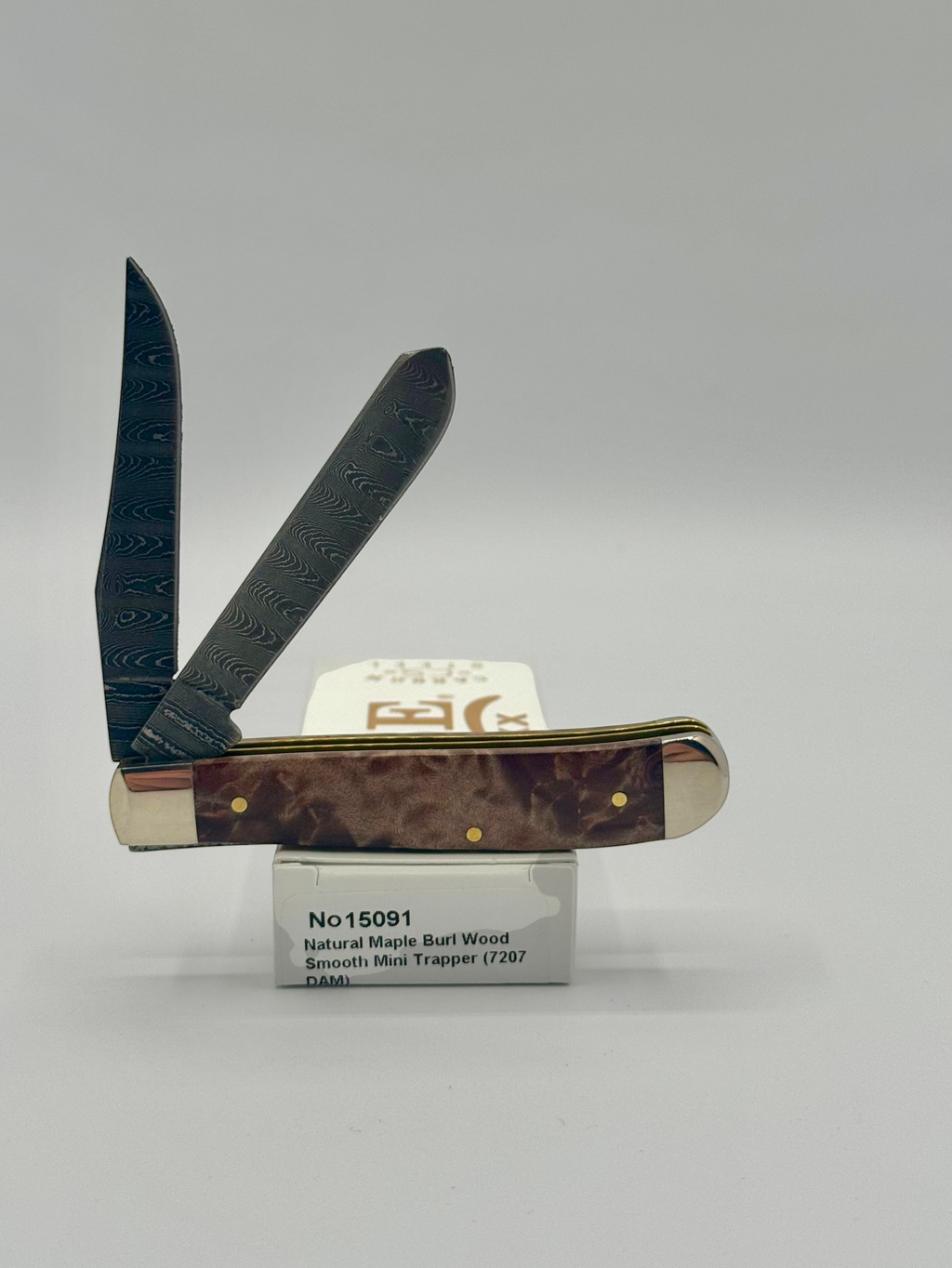 Case XX 15091 Natural Maple Burl Wood Ladder Damascus Mini Trapper — angled open view