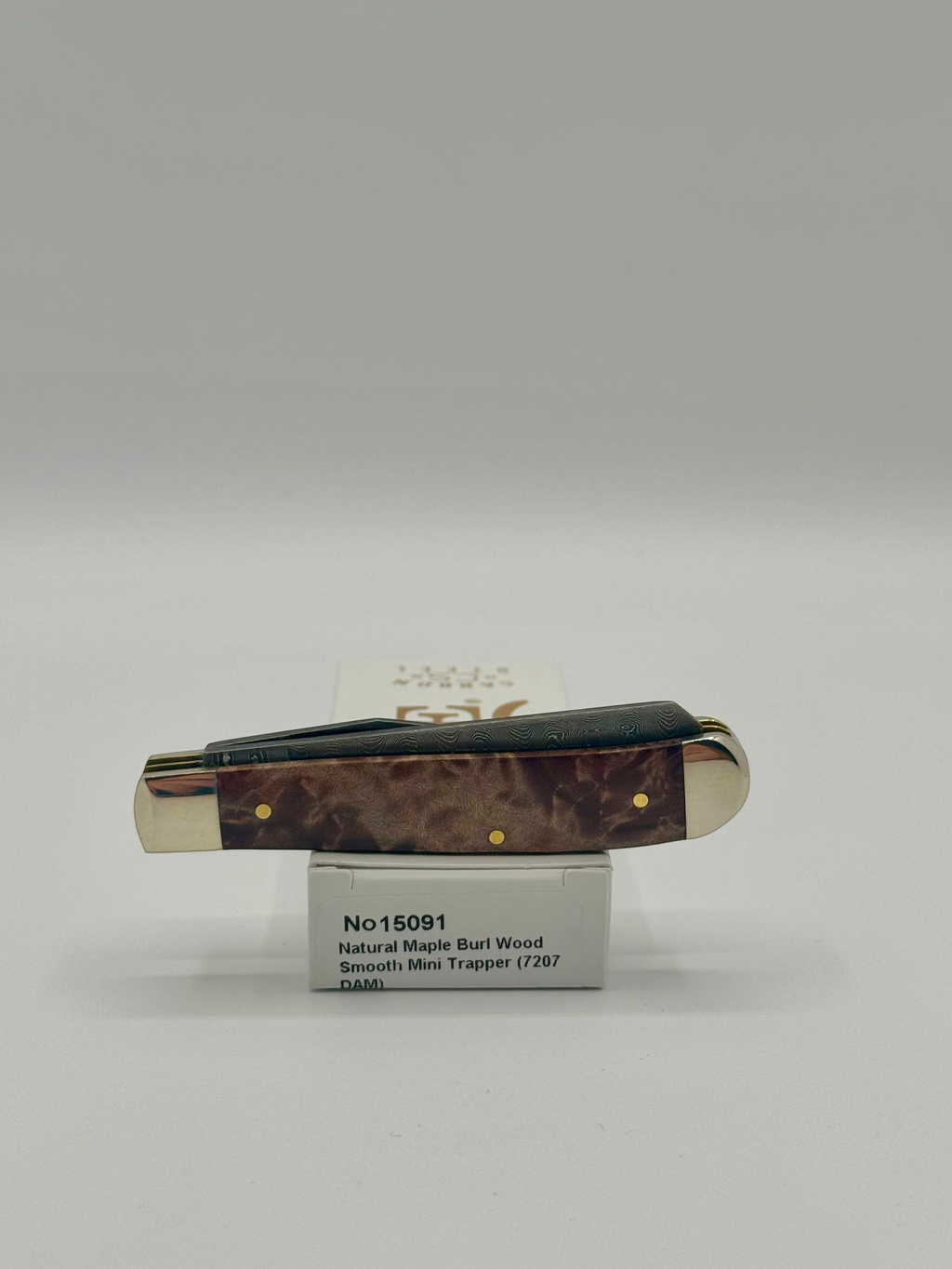 Case XX 15091 Natural Maple Burl Wood Ladder Damascus Mini Trapper — packaging and knife together