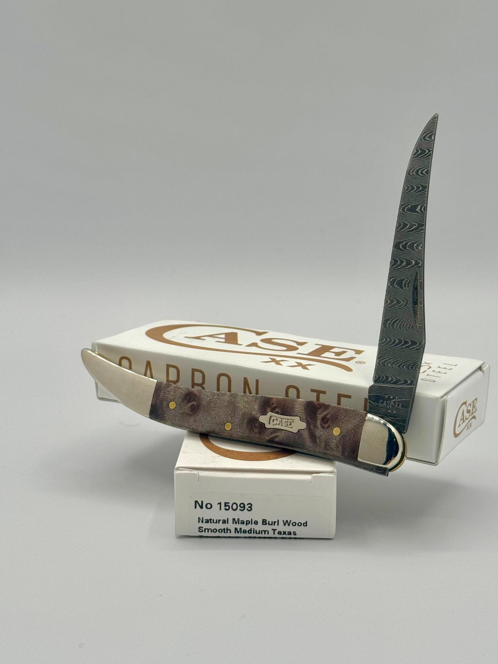 Case XX 15093 Smooth Natural Maple Burl Wood Damascus Medium Toothpick — closed on Case box
