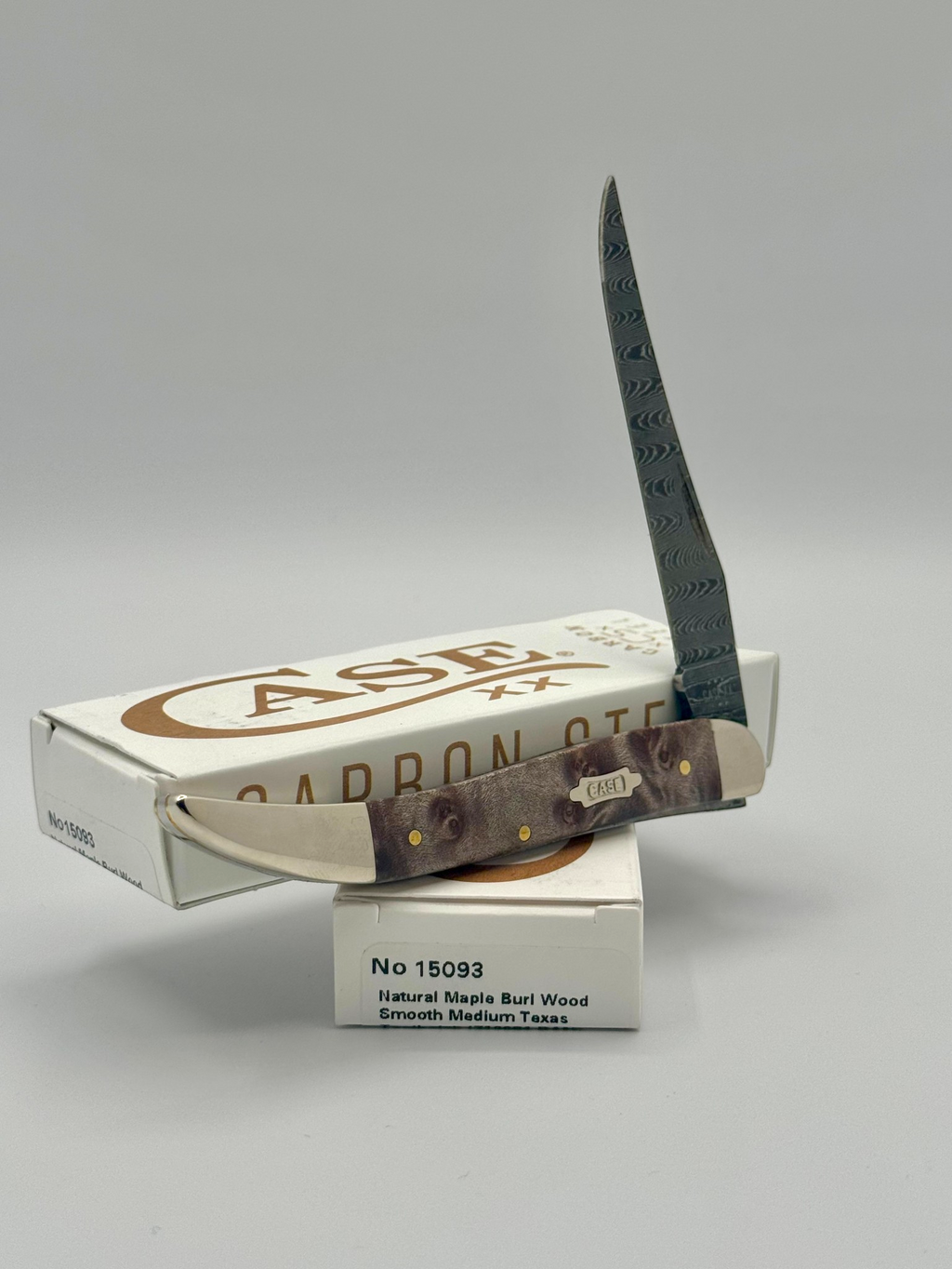 Case XX 15093 Smooth Natural Maple Burl Wood Damascus Medium Toothpick — blade detail on Case box