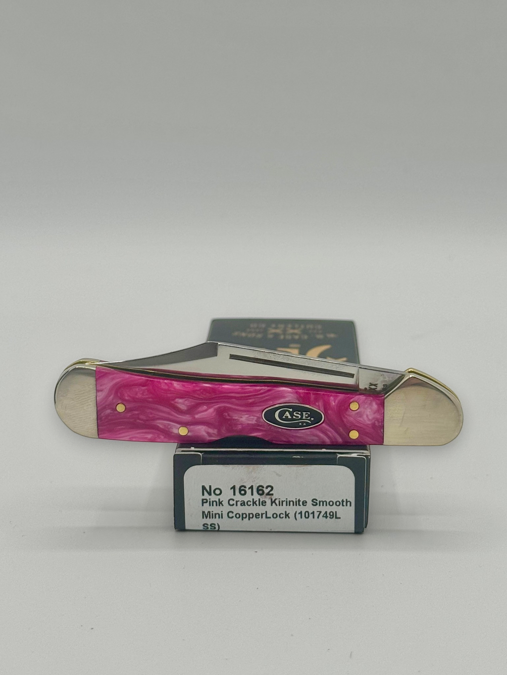 Case XX 16162 Pink Crackle Mini CopperLock — lifestyle angle on Case box