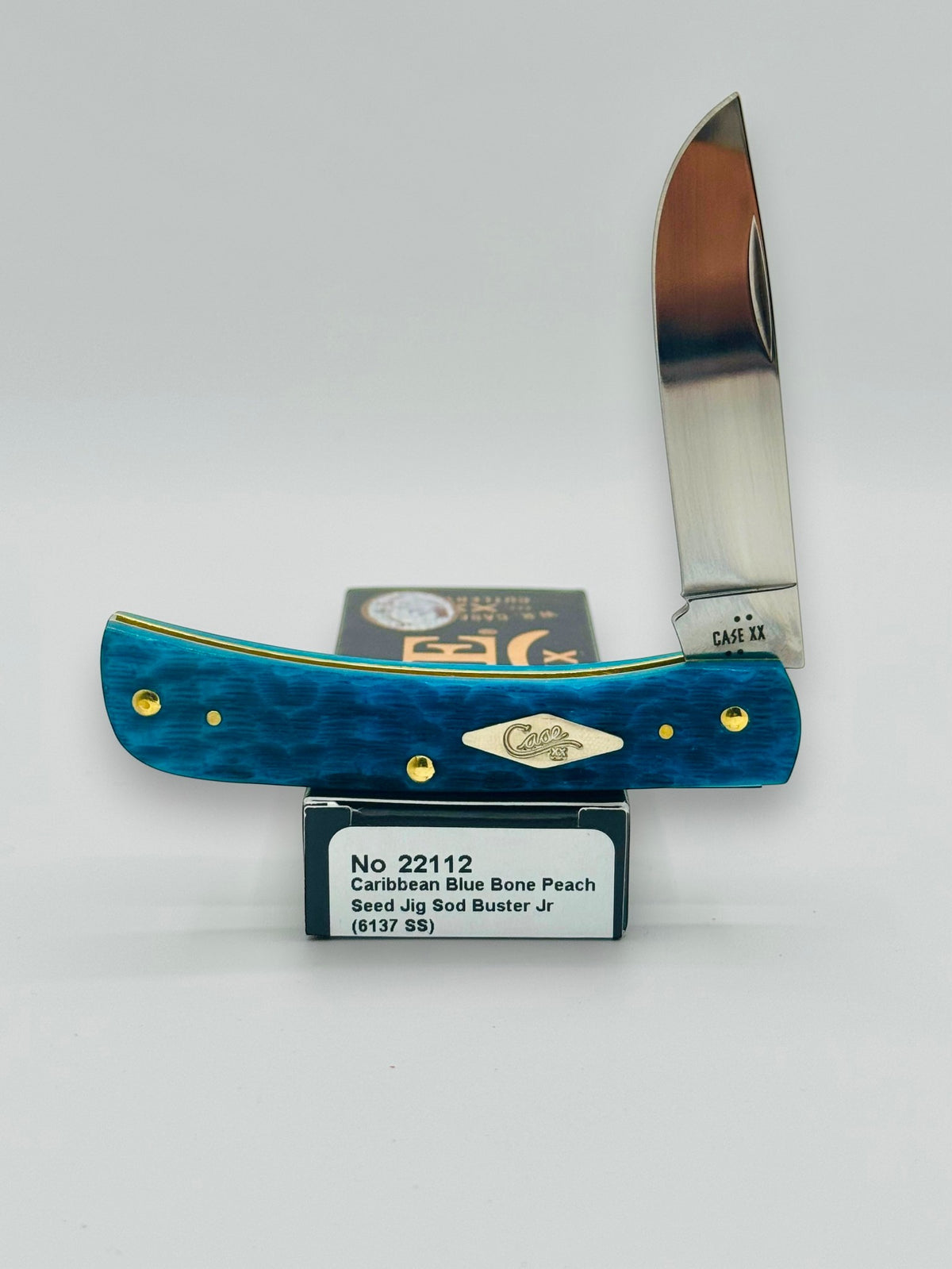 Case XX 22112 Sod Buster Jr Caribbean Blue Bone — open on Case retail box