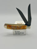 Case XX 27233 Damascus Burnt Natural Bone Deep Canyon Jig Mini Trapper — open on Case retail box