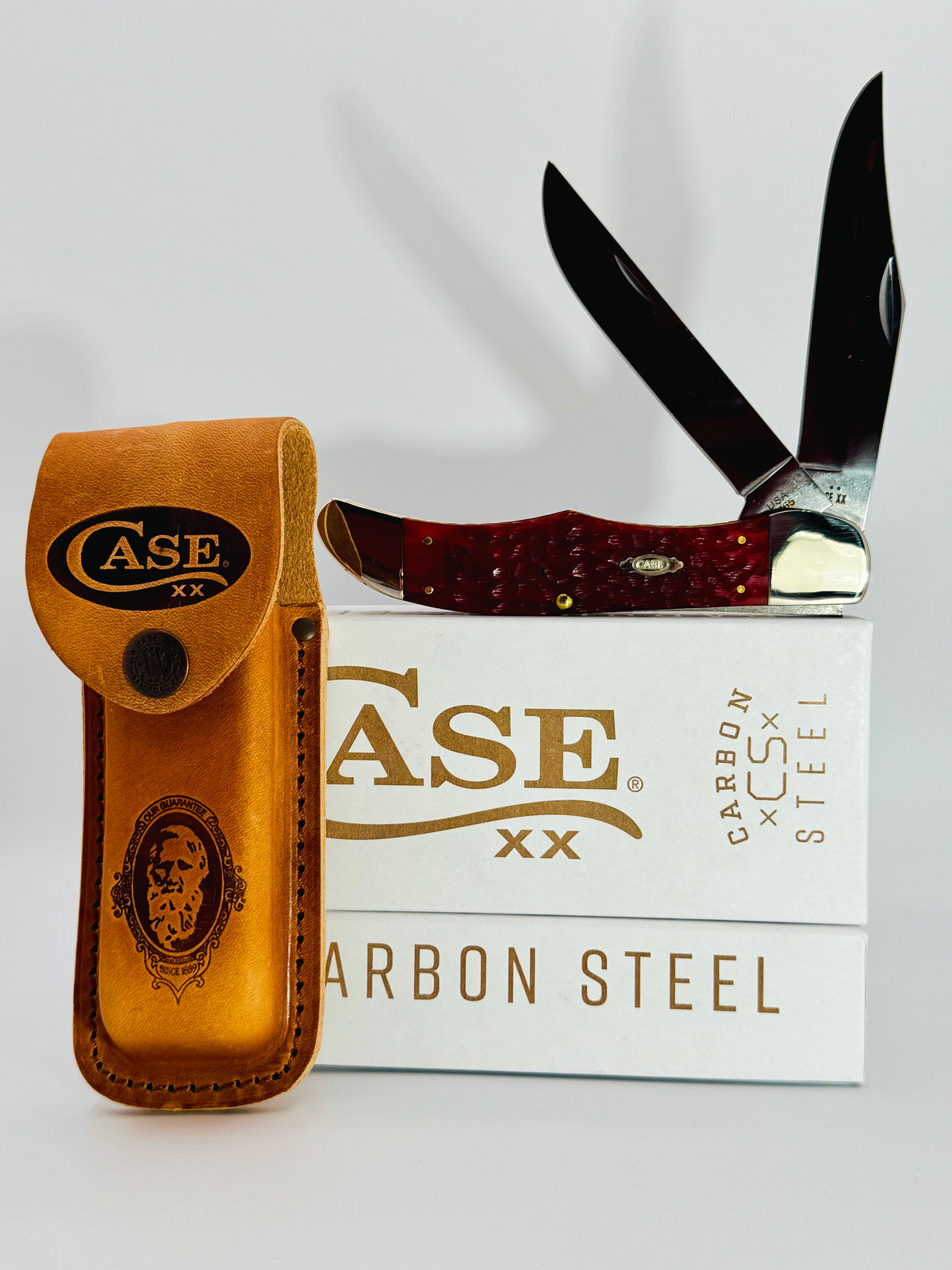Case XX 31960 Dark Red Bone Peach Seed Jig CS Folding Hunter with Sheath, photo 1