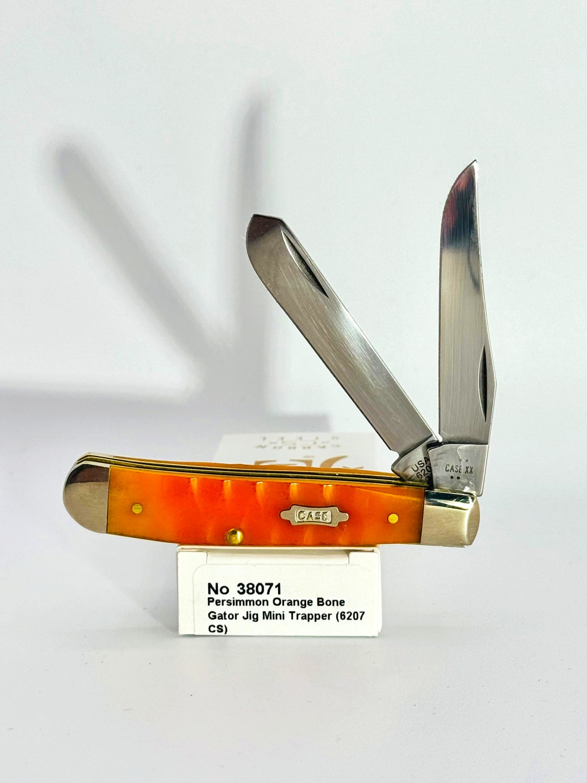Case XX 38071 persimmon orange Gator Jig bone Mini Trapper, photo 1