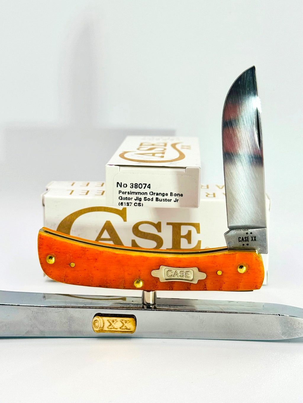 Case XX 38074 persimmon orange Gator Jig bone Sod Buster Jr., photo 1