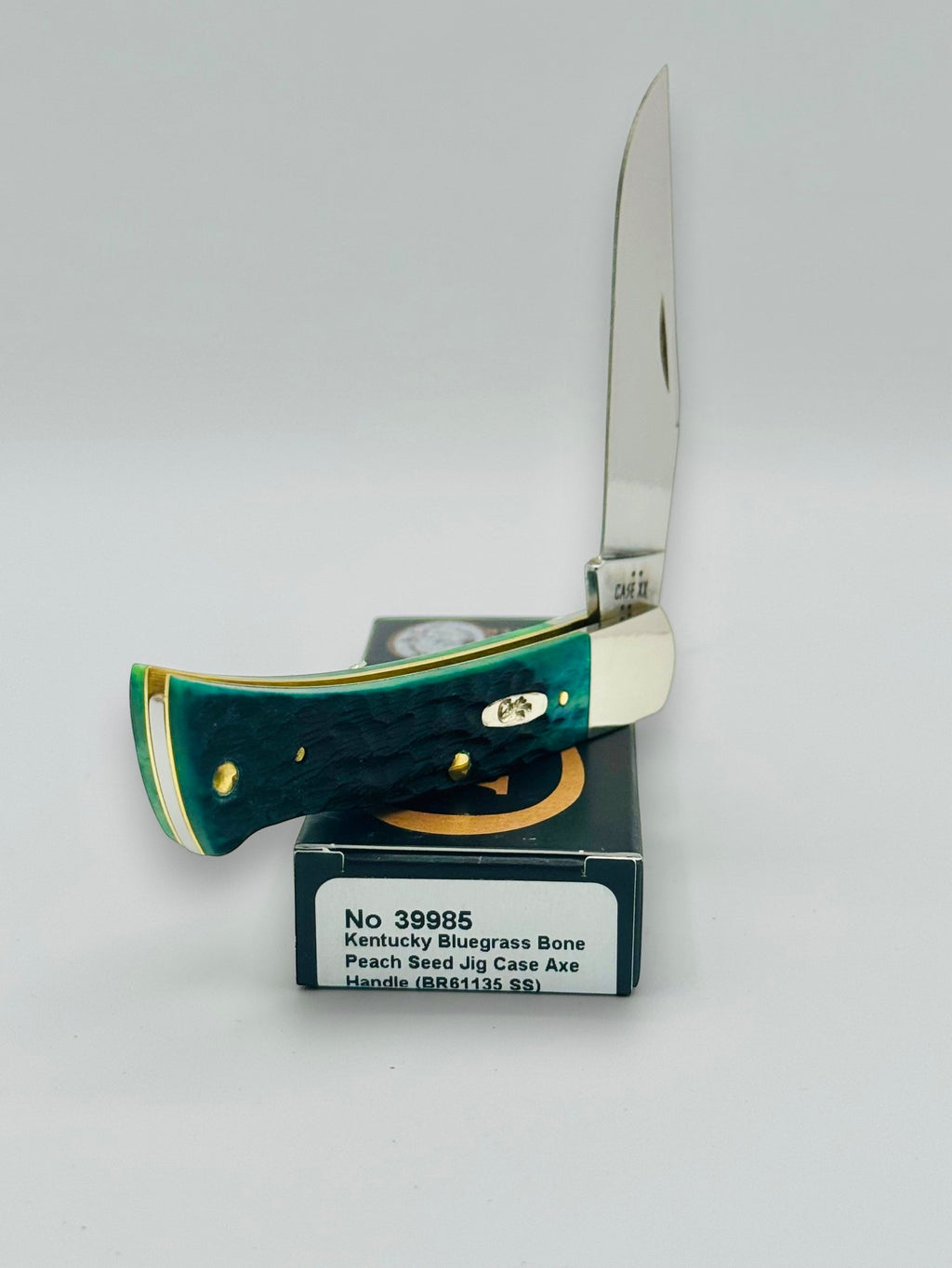 Case XX 39985 Axe Handle Kentucky Bluegrass Bone — blade detail on Case box