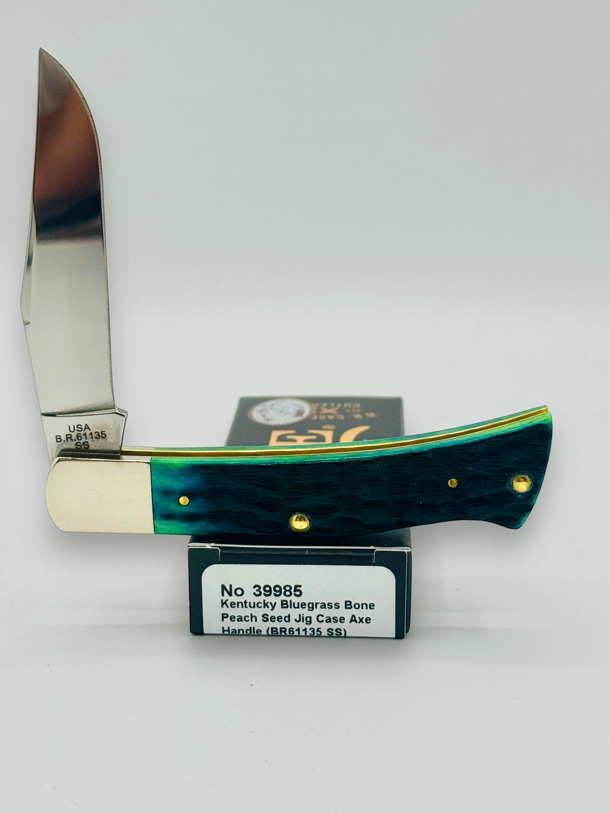 Case XX 39985 Axe Handle Kentucky Bluegrass Bone — angled open on Case box