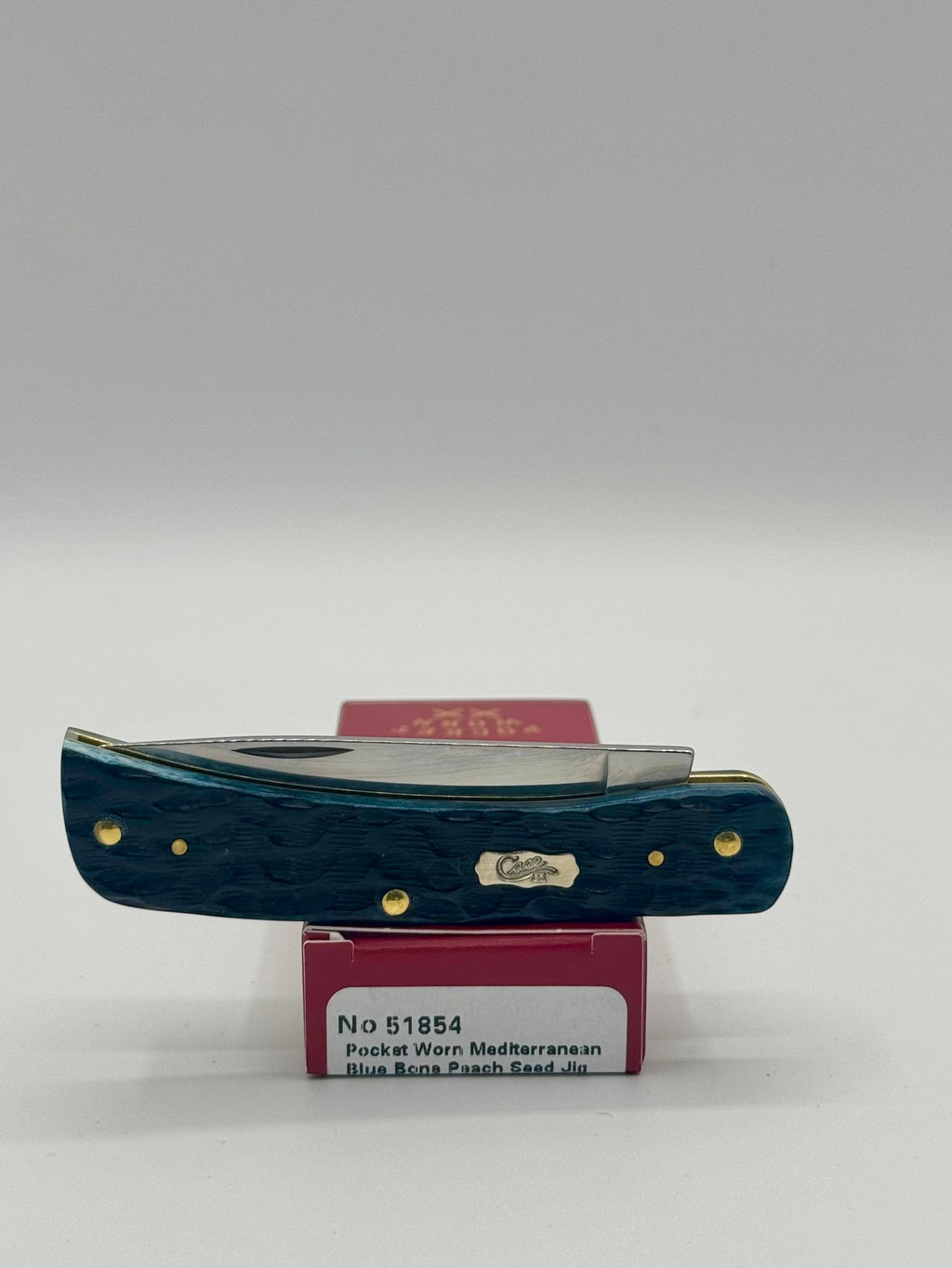 Case XX 51854 Mediterranean Blue Bone Sod Buster Jr — lifestyle angle on Case box