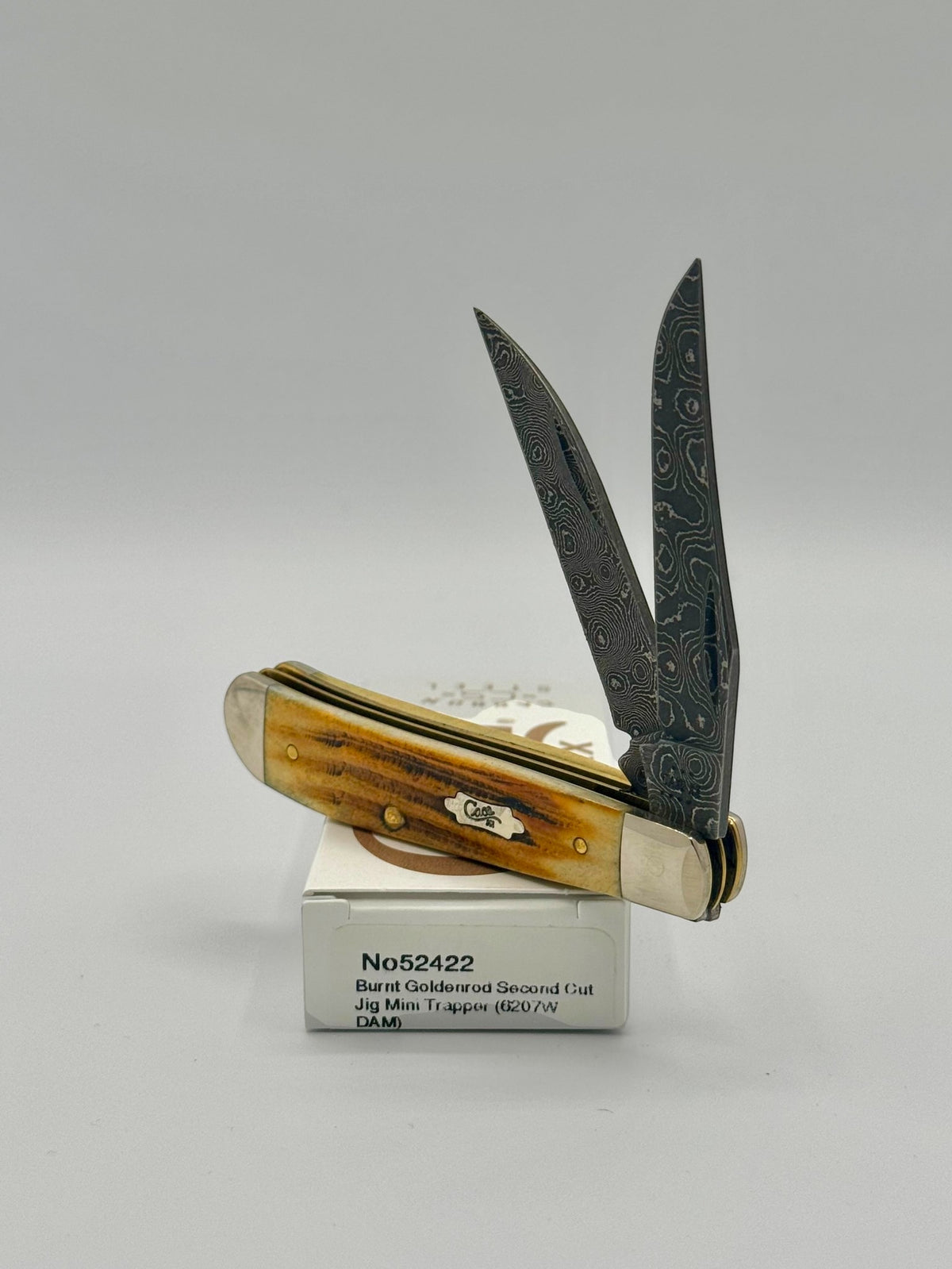 Case XX 52422 Burnt Goldenrod Second Cut Damascus Mini Trapper — closed on Case box