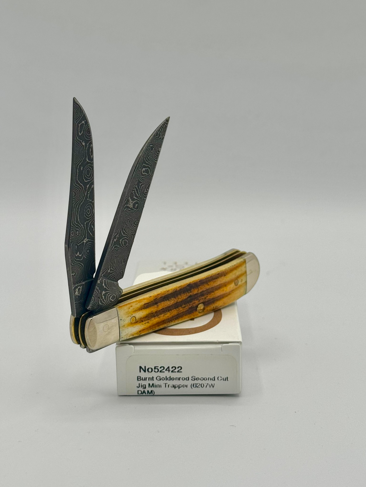 Case XX 52422 Burnt Goldenrod Second Cut Damascus Mini Trapper — back side on Case box