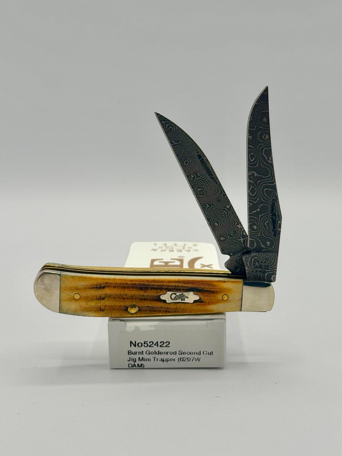 Case XX 52422 Burnt Goldenrod Second Cut Damascus Mini Trapper — open on Case retail box
