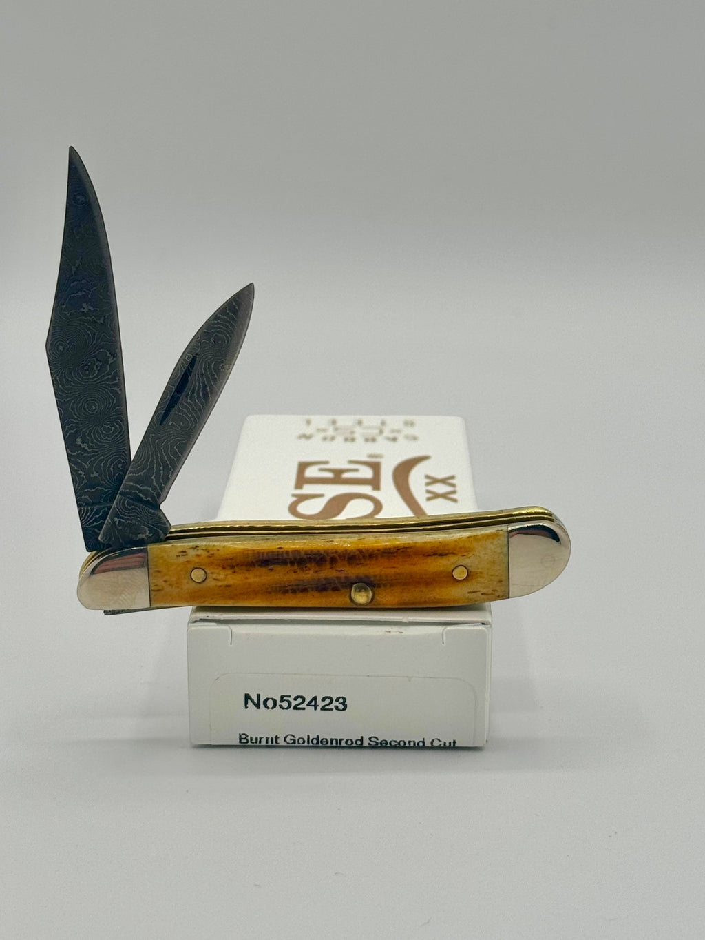 Case XX 52423 Burnt Goldenrod Second Cut Damascus Peanut — angled open view