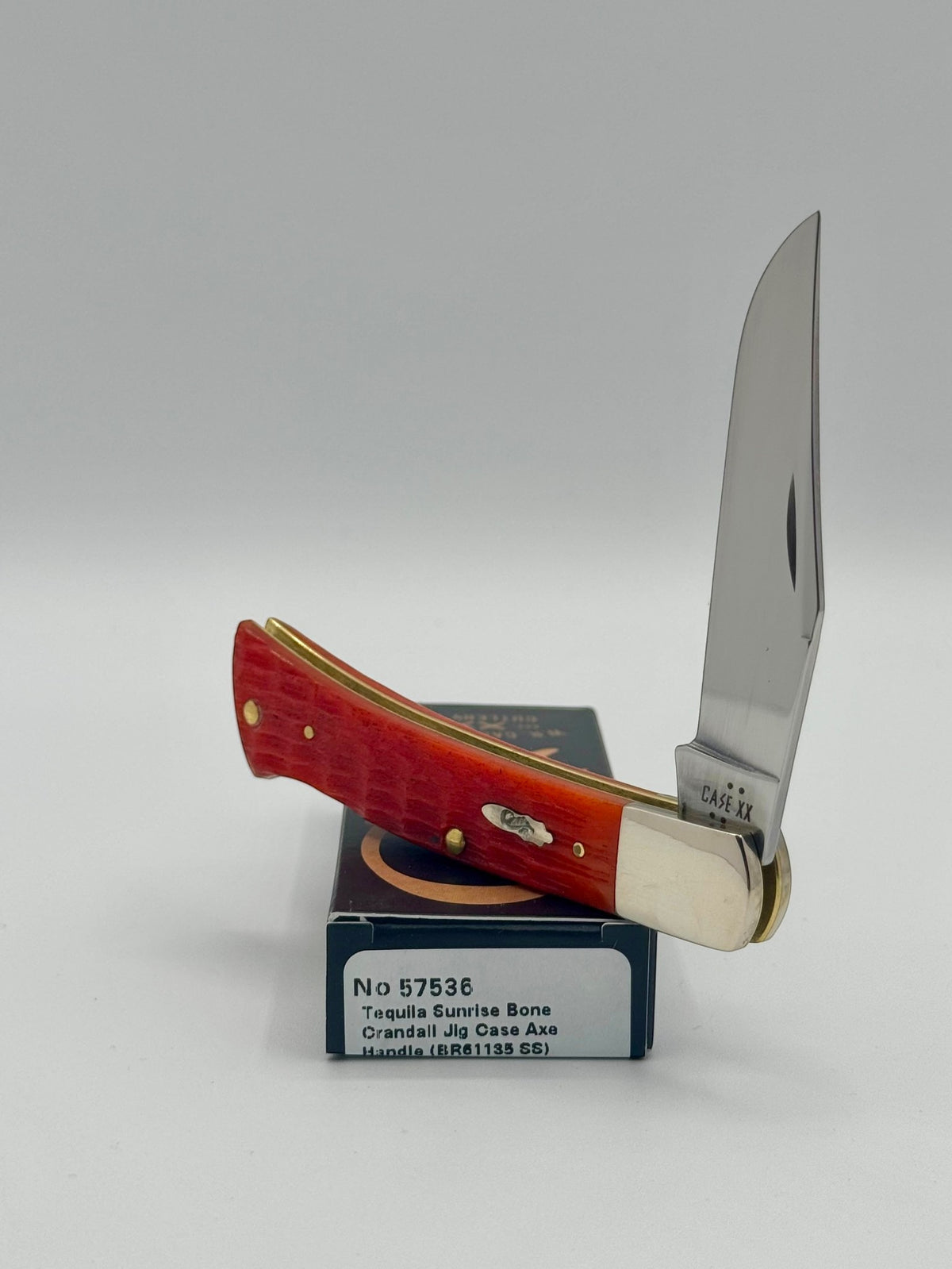 Case XX 57536 Tequila Sunrise Bone Axe Handle — closed on Case box
