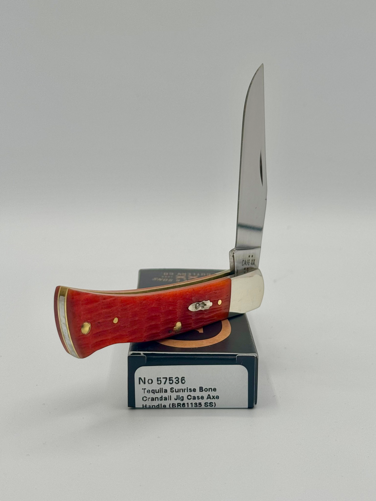 Case XX 57536 Tequila Sunrise Bone Axe Handle — blade detail on Case box