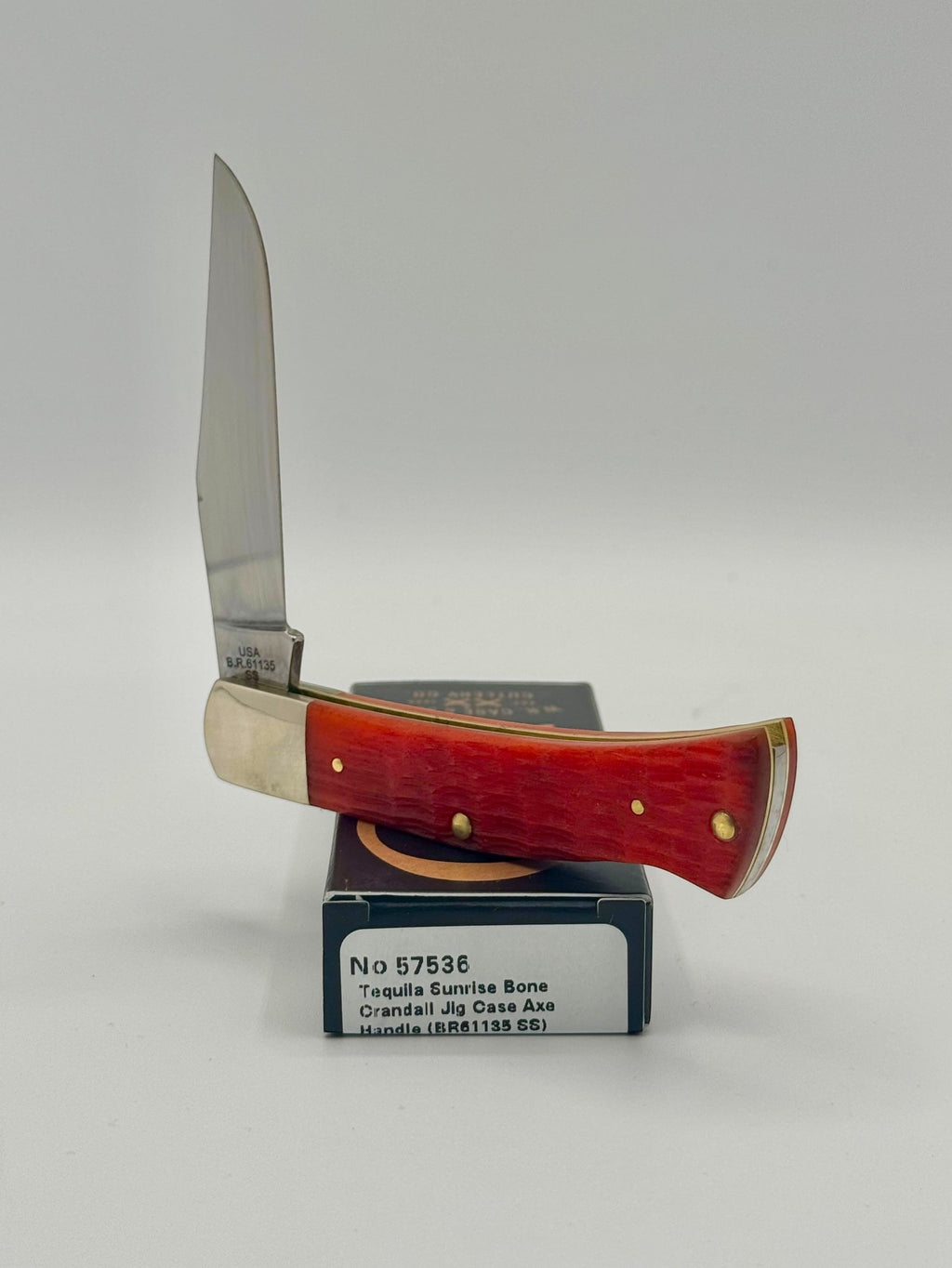 Case XX 57536 Tequila Sunrise Bone Axe Handle — handle and shield detail