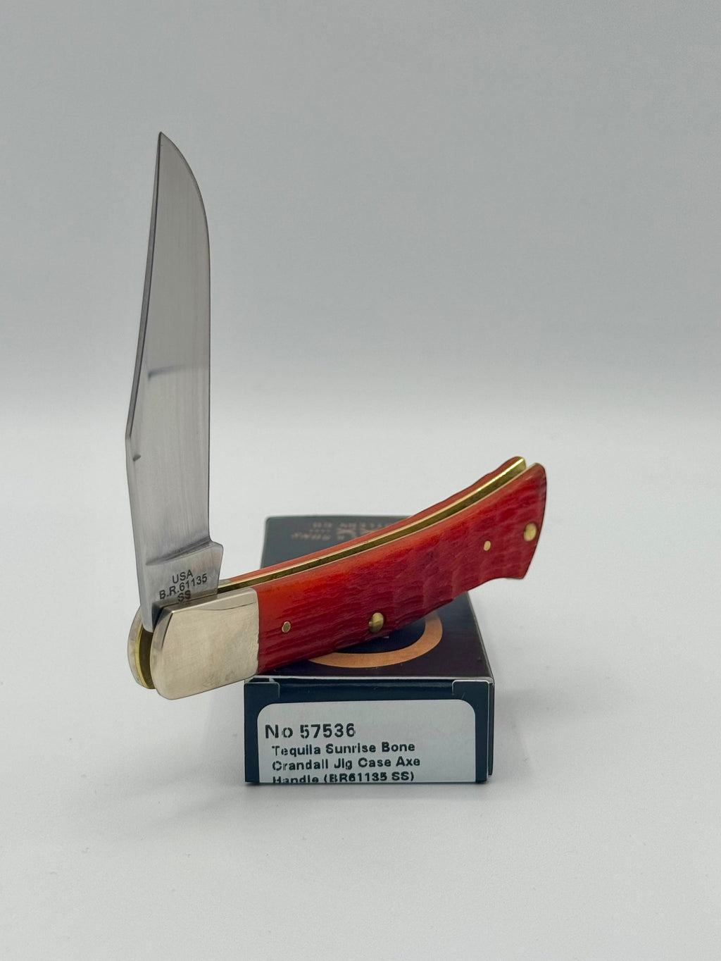 Case XX 57536 Tequila Sunrise Bone Axe Handle — back side on Case box