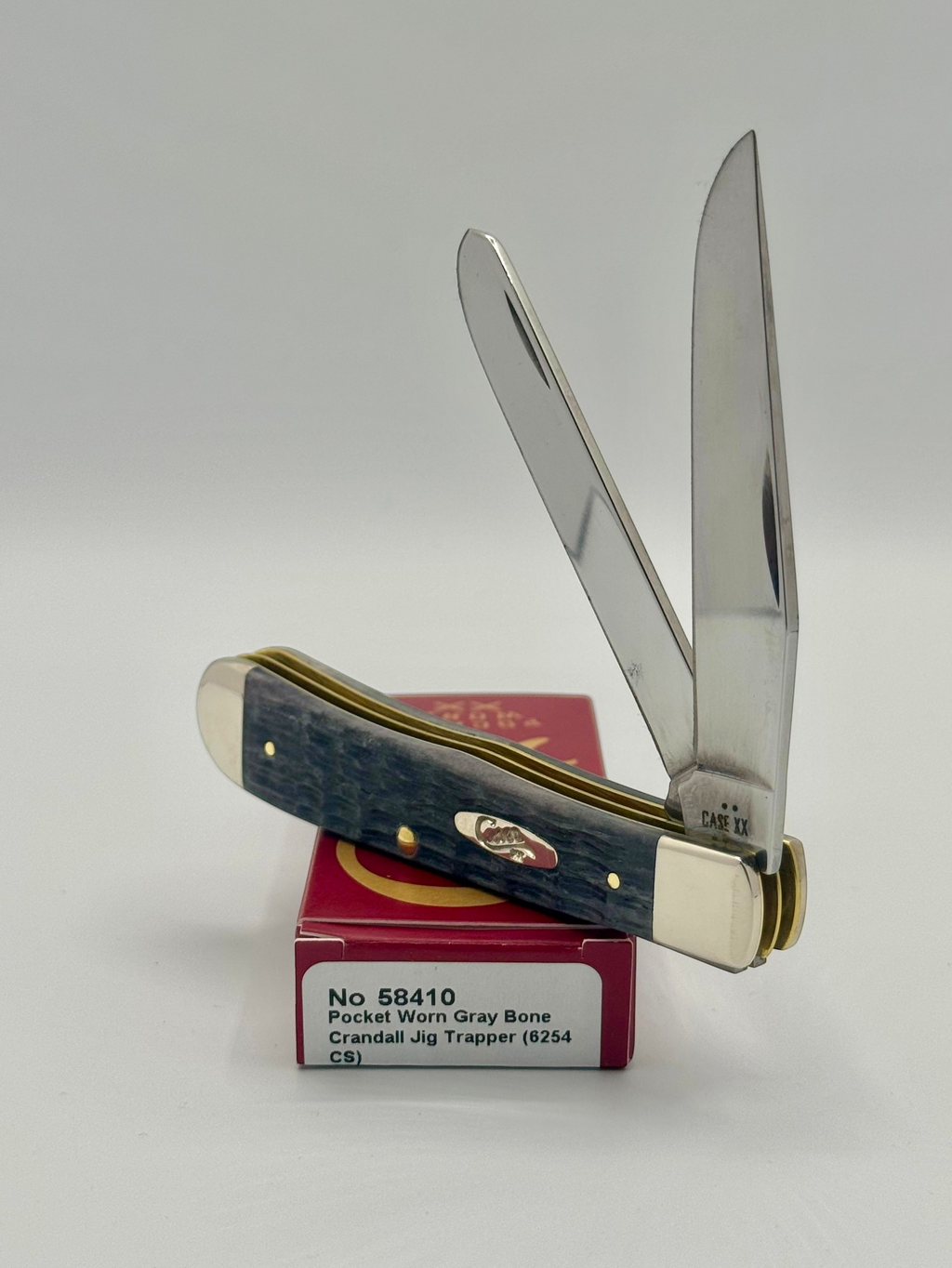 Case XX 58410 Gray Bone Trapper CV — closed on Case box