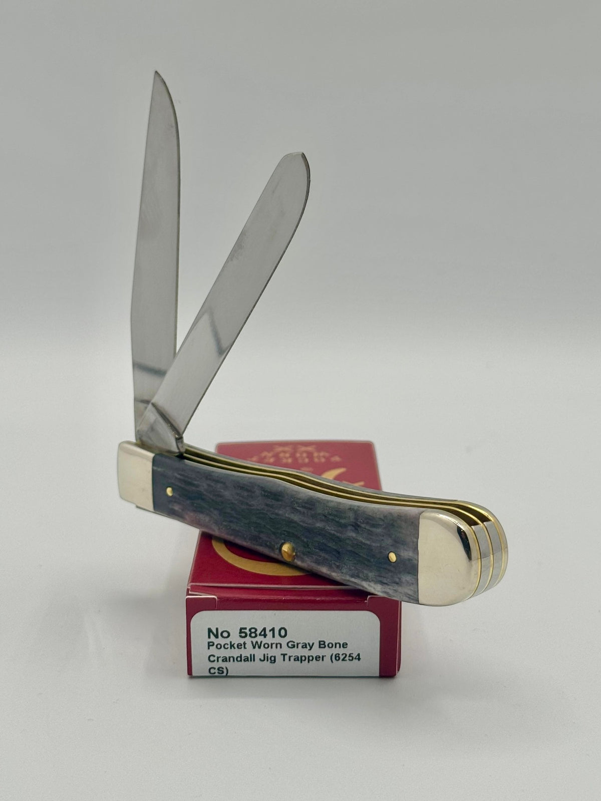 Case XX 58410 Gray Bone Trapper CV — handle and shield detail