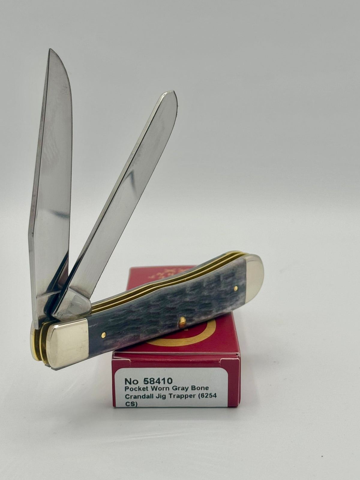 Case XX 58410 Gray Bone Trapper CV — back side on Case box