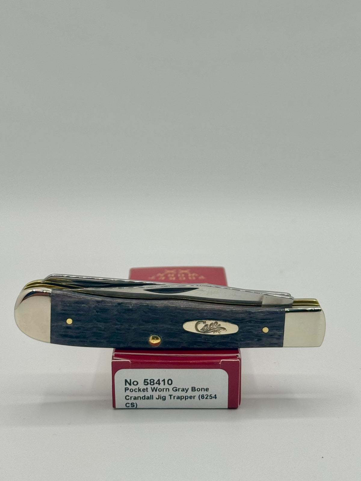 Case XX 58410 Gray Bone Trapper CV — lifestyle angle on Case box