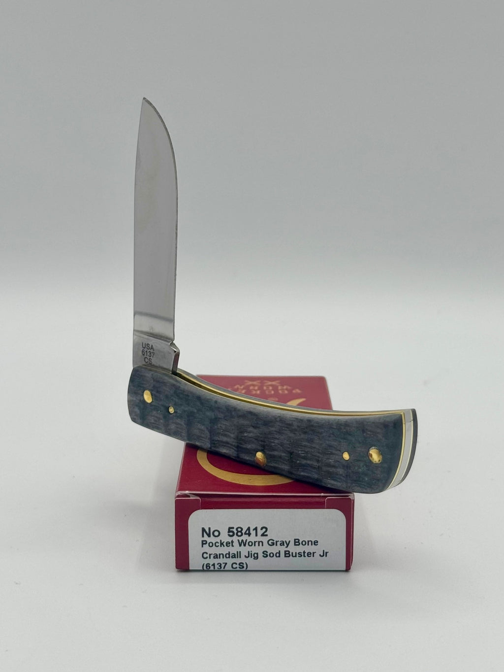 Case XX 58412 Gray Bone Sod Buster Jr CV — handle and shield detail