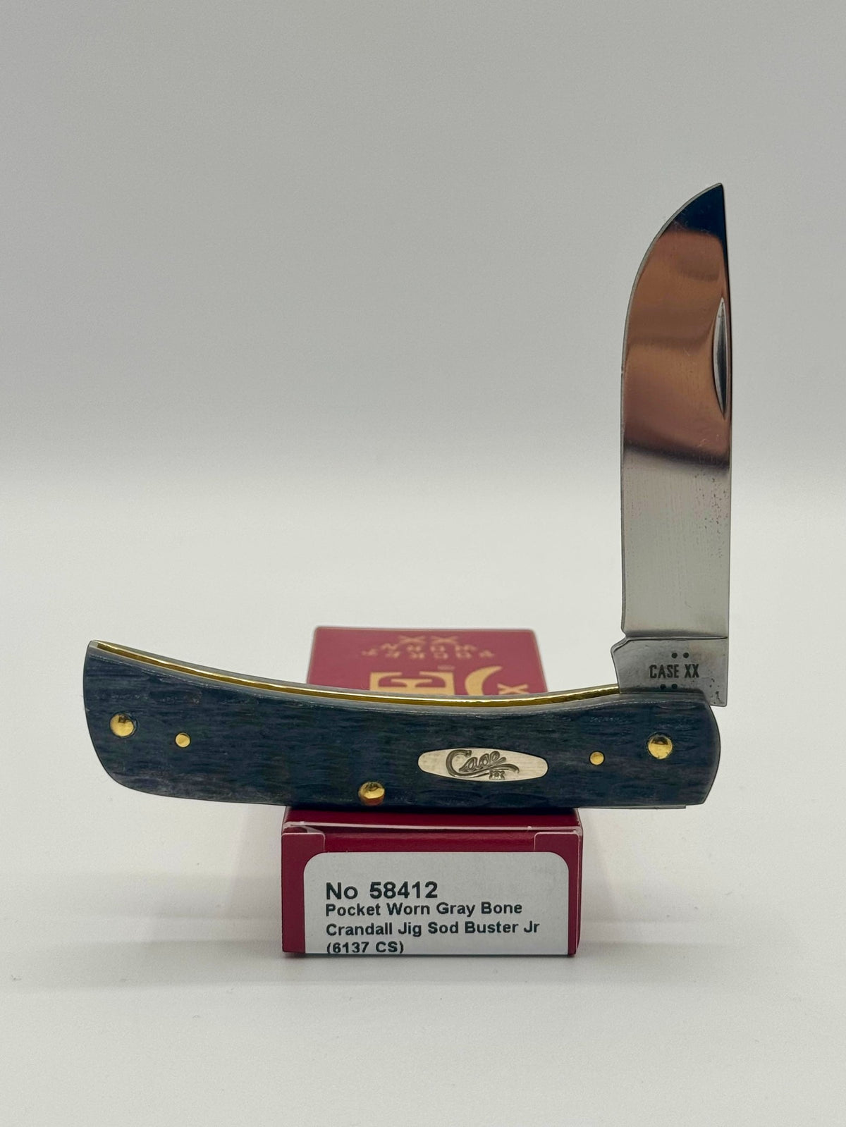 Case XX 58412 Gray Bone Sod Buster Jr CV — open on Case retail box