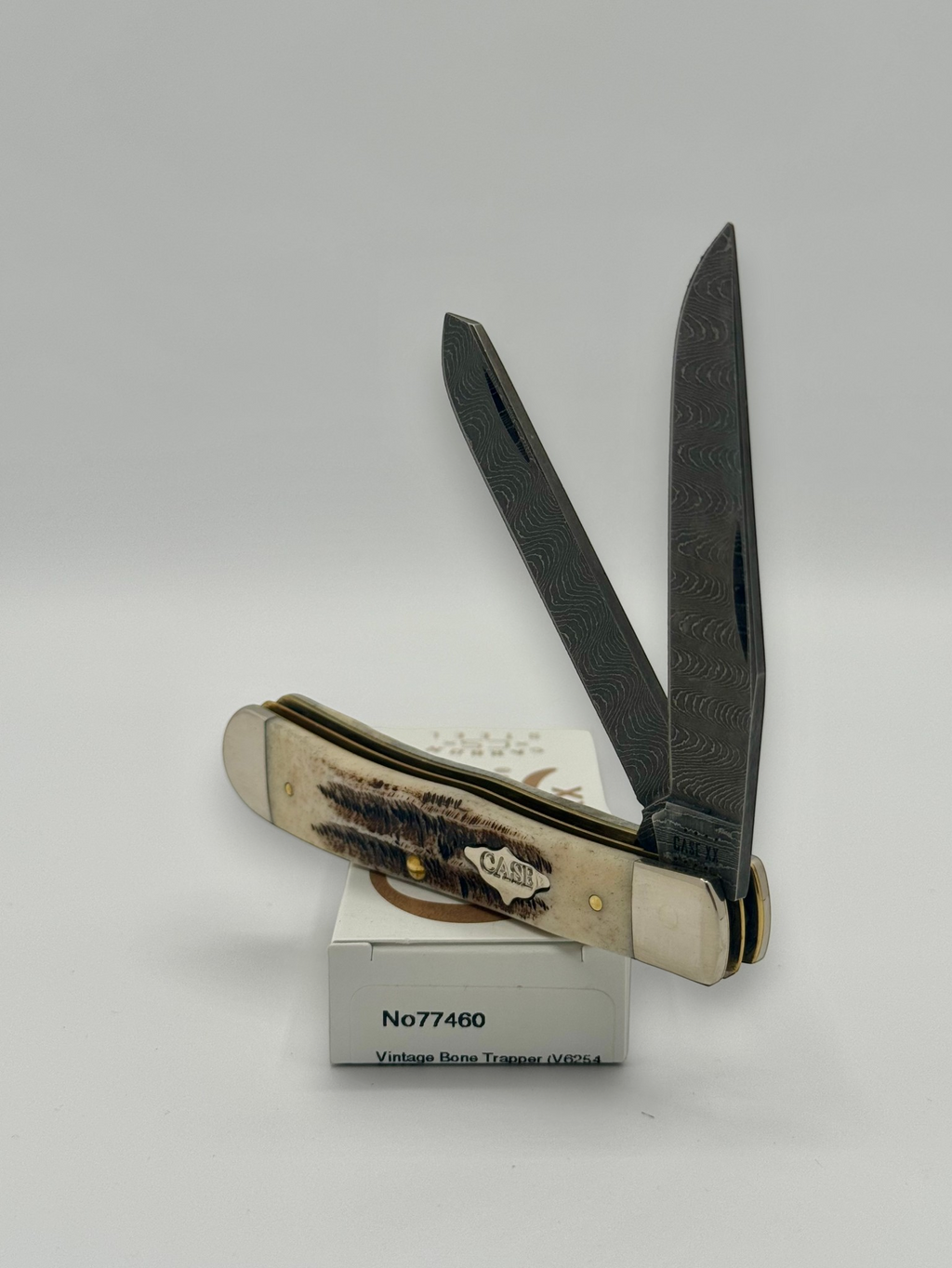 Case XX 77460 Vintage Bone Trapper Damascus — blade detail on Case box