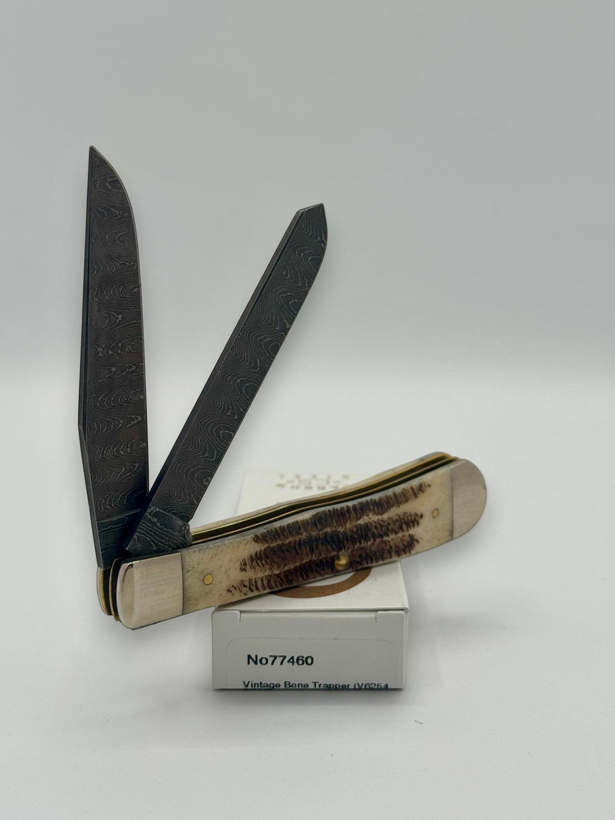 Case XX 77460 Vintage Bone Trapper Damascus — angled open view