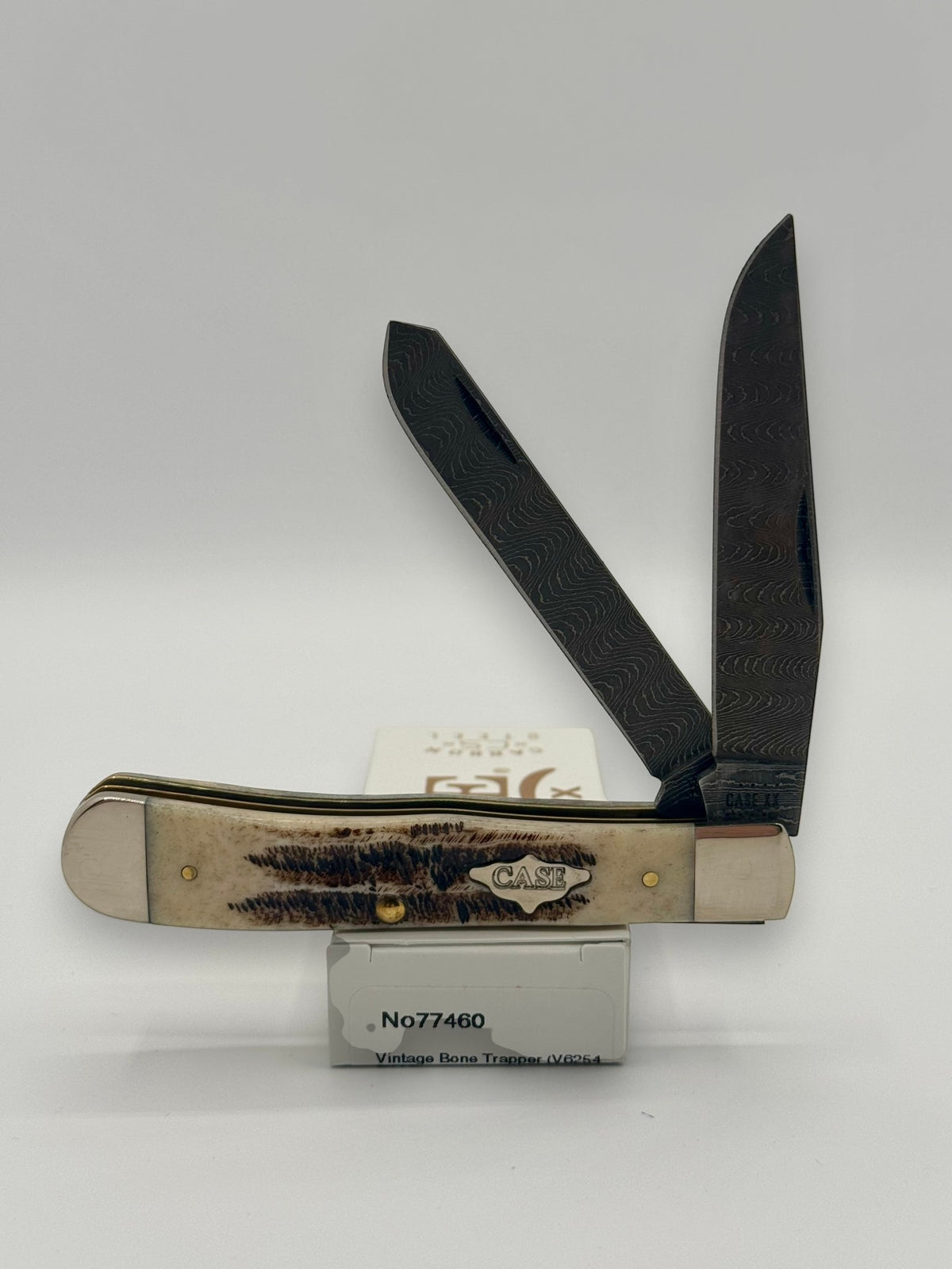 Case XX 77460 Vintage Bone Trapper Damascus — closed on Case box